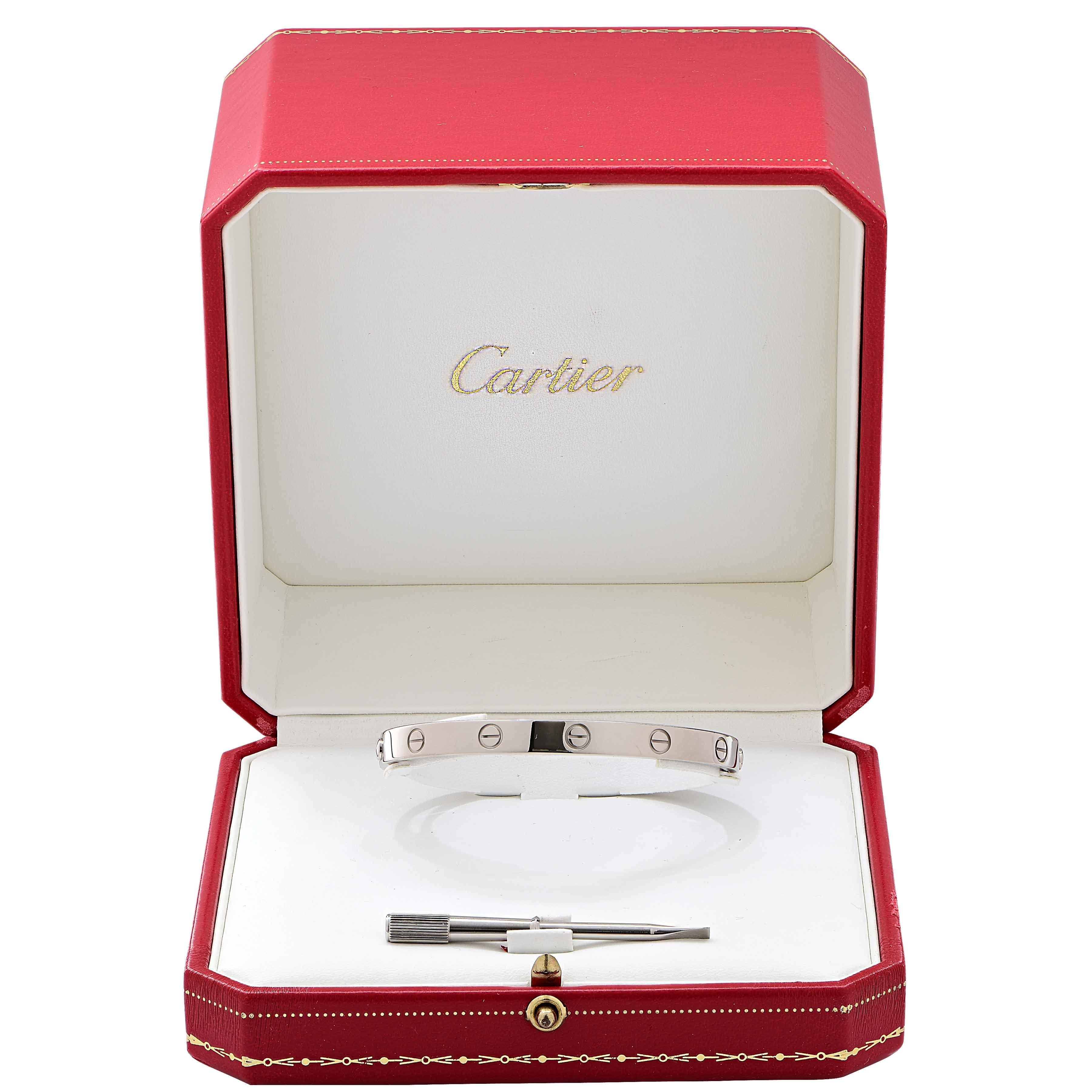 Cartier Love Bracelet Bangle in 18 Karat White Gold Circa 1993 Original Box Included.
Size 18
Metal Type: 18 Karat White Gold
Metal Weight: 22.3 Grams