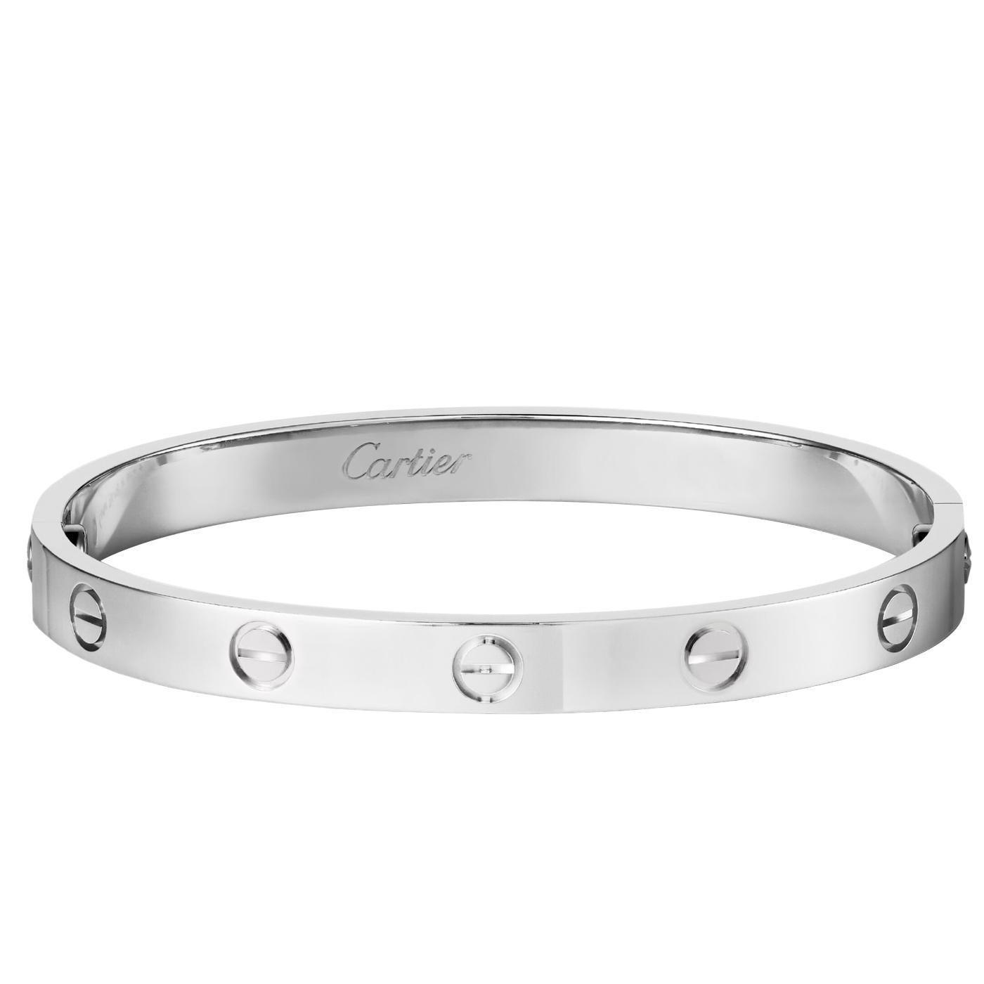 LOVE bracelet, 18K white gold 750 hallmark. Width: 6.1 mm. Created in New York, the LOVE bracelet is an icon of jewelry design: a close-fitting, oval bracelet composed of two rigid arcs that is worn on the wrist and removed using a specific