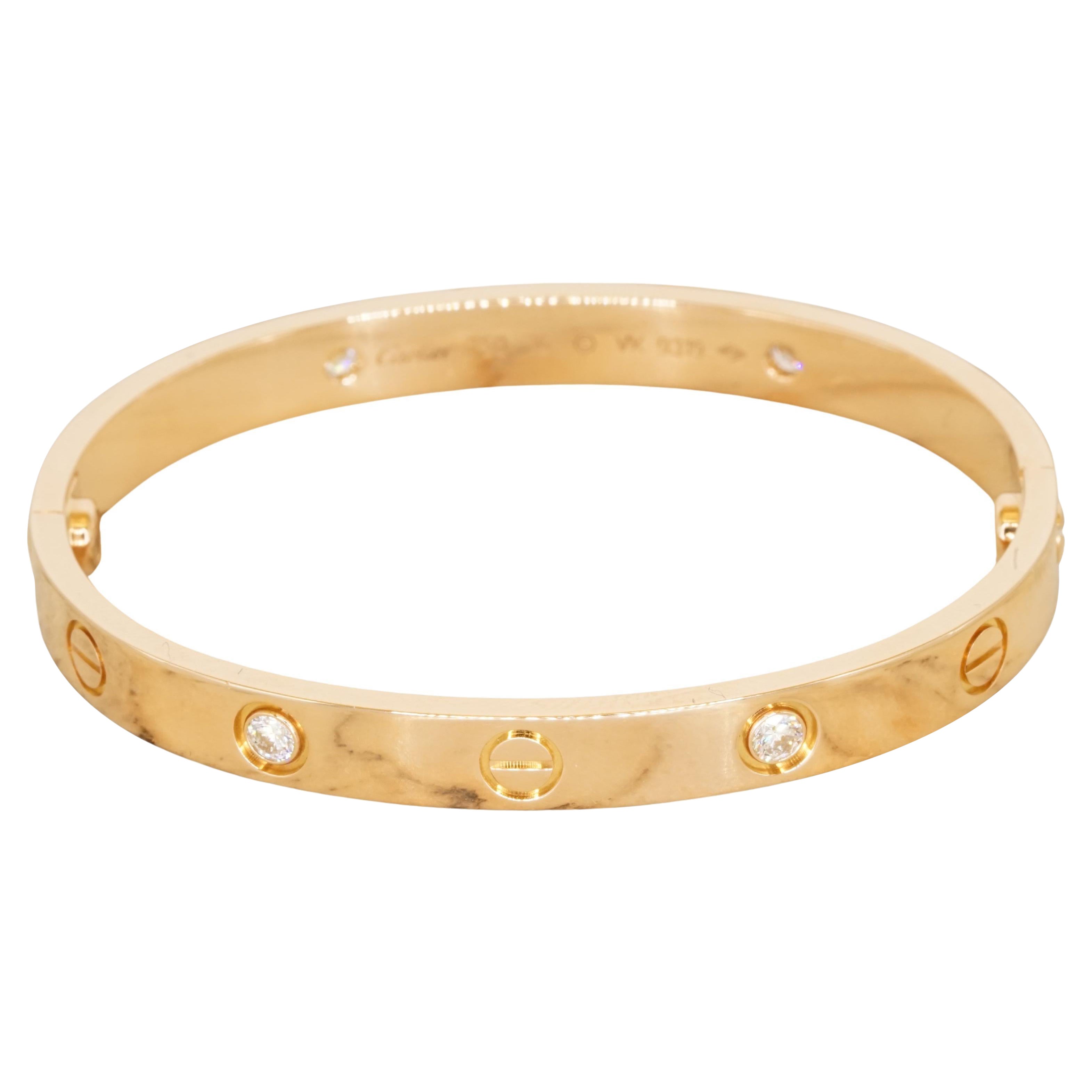 Experience the timeless elegance of the iconic Cartier LOVE bracelet, a masterpiece of jewelry design originally created in New York in 1969. This classic model is crafted in 18K rose gold (750/1000) with a brushed finish, adorned with four