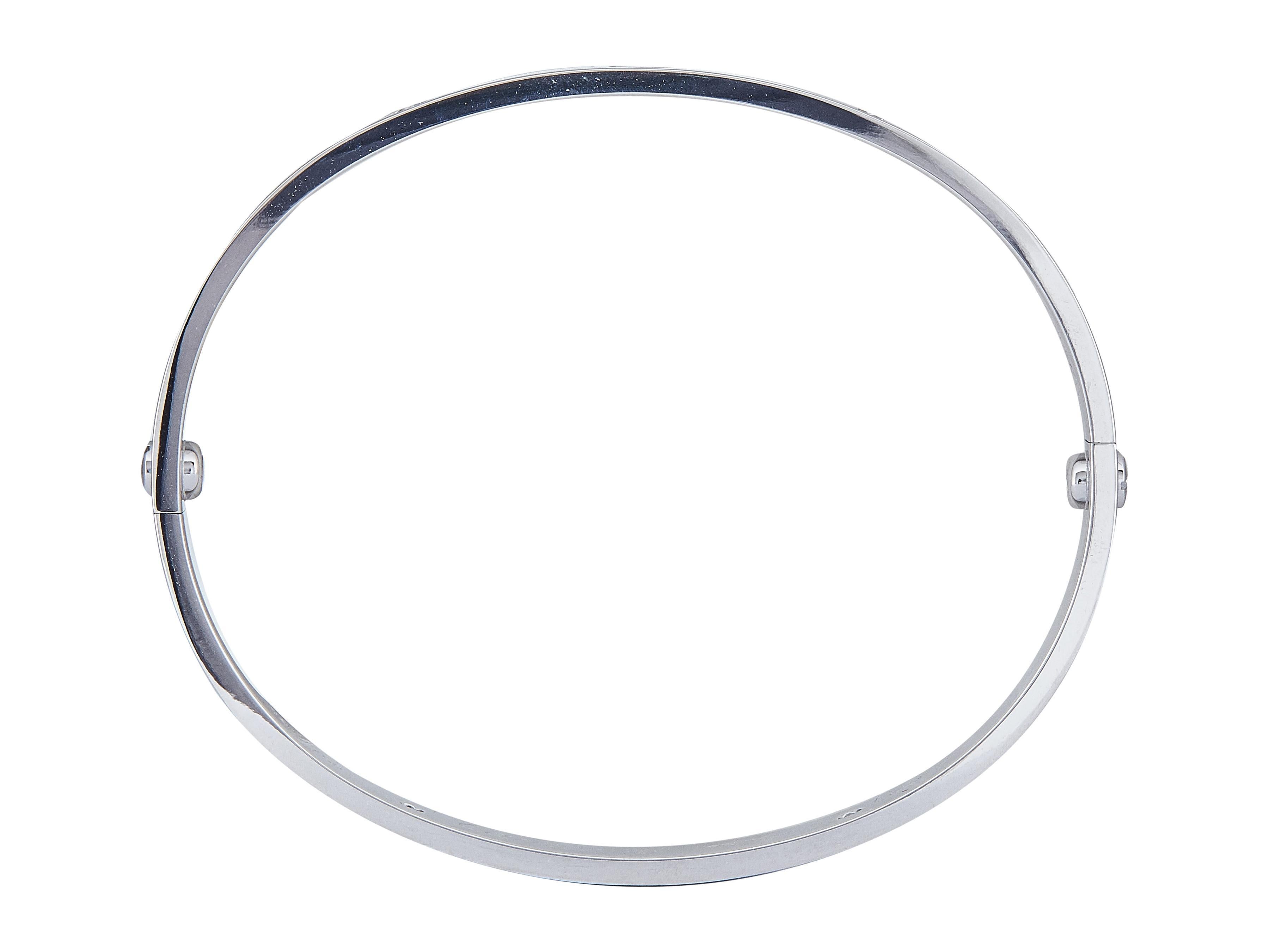 Der Armreif: Ein Cartier LOVE Armreif aus 18 Karat Weißgold, besetzt mit vier runden Brillanten. Dieses Classic-Modell hat die Größe 18. 

Begleitet von ...
Servicepapier
Cartier Schraubendreher

Das Armband ist in ausgezeichnetem Zustand, mit nur