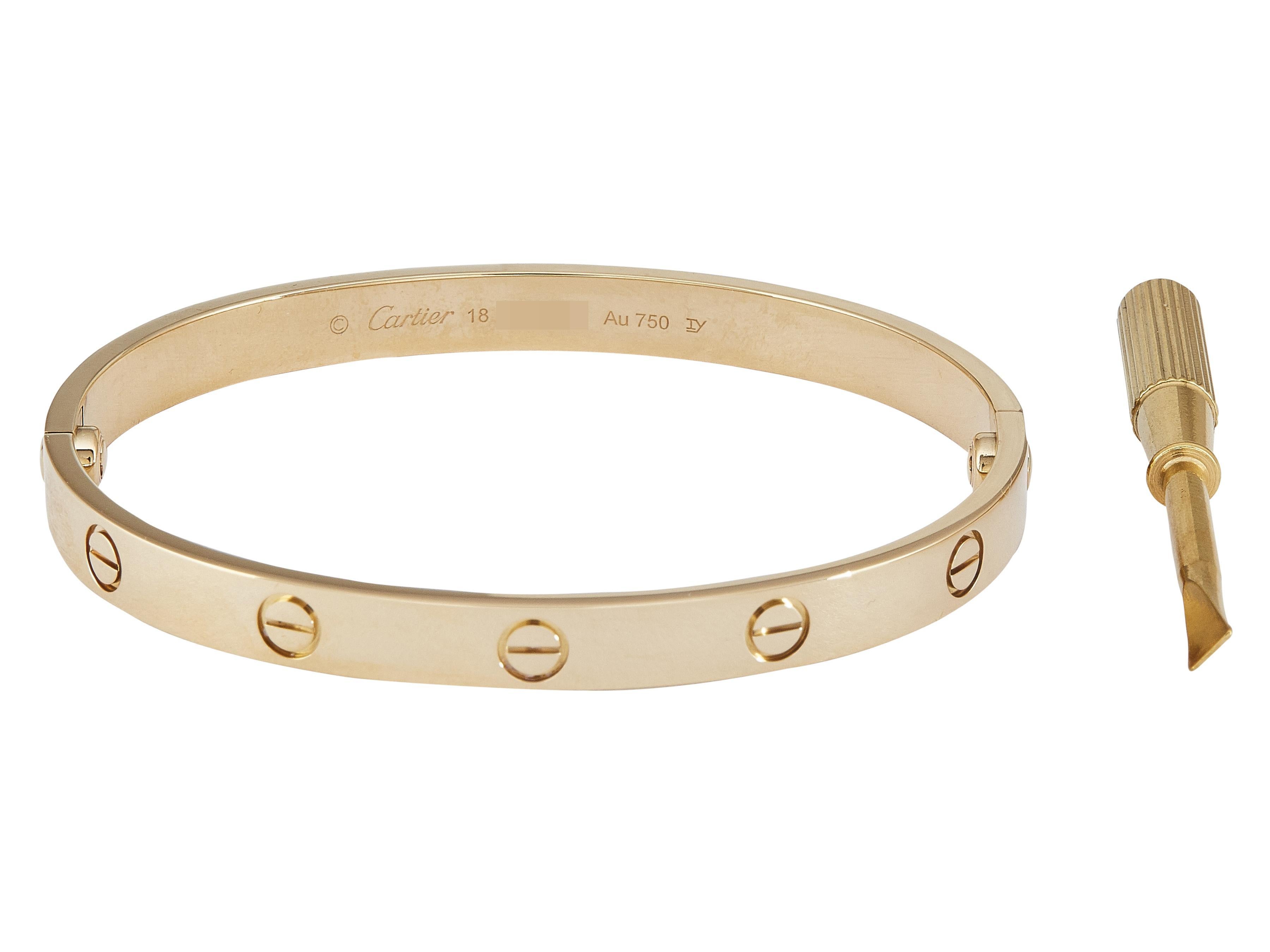 La pulsera: Una pulsera brazalete LOVE de Cartier diseñada en oro amarillo de dieciocho quilates. Este modelo Clásico es una talla 18. 

La pulsera está en excelente estado, con sólo unos pequeños arañazos propios del uso normal. La marca ha