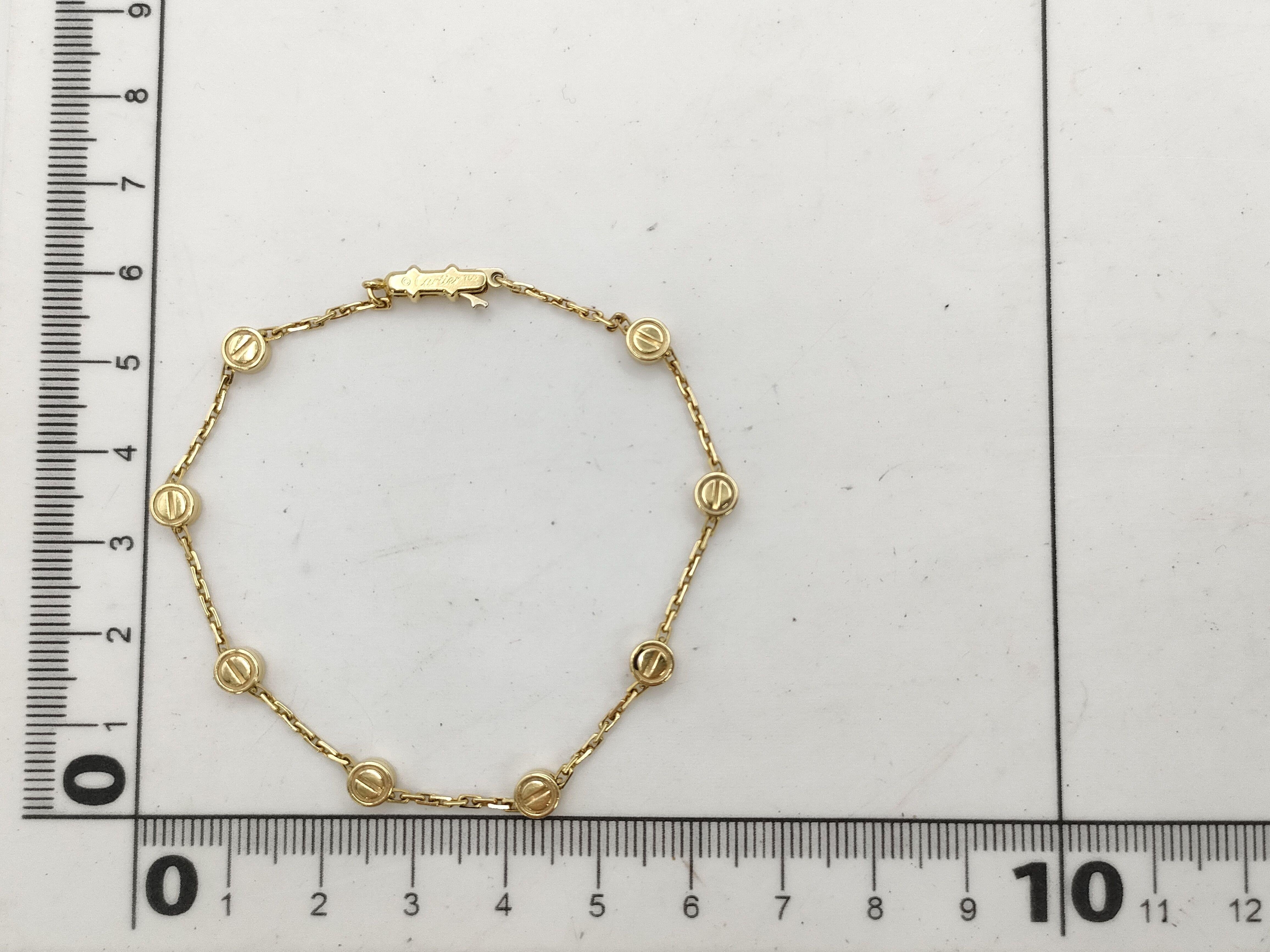 Brand : Cartier
Description: Cartier Love Bracelet 
Metal Type: 750YG/Yellow Gold
Total Weight:  7.2g
Condition: Preowned; small signs of wearing
Box -  Not Included
Papers -  Not Included
