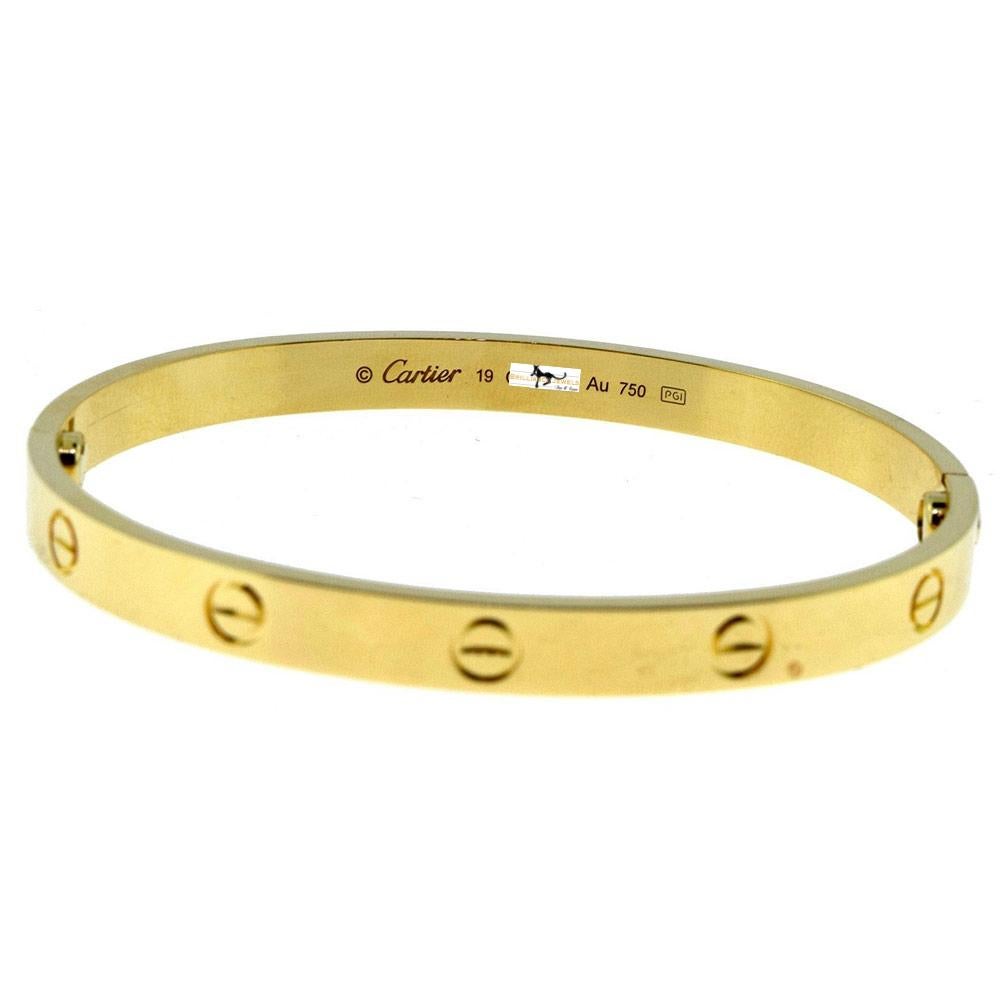 REF: C- 402

Designer: Cartier

Collection: Love

Style: Bangle Bracelet

Metal: Yellow Gold

​​​​​​​Metal Purity: 18k

Bracelet Size: 16 = 16 cm

Hallmarks: 16, Au750 Cartier, Serial No.,

Retail: $6,300 excluding tax.

Includes:  24 Months