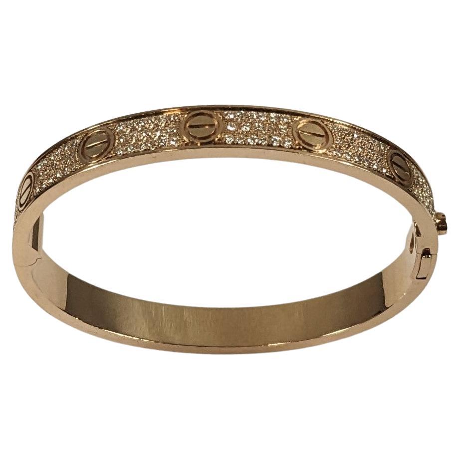 Cartier LOVE Bracelet in 18k rose gold with pavé of diamonds box and papers For Sale