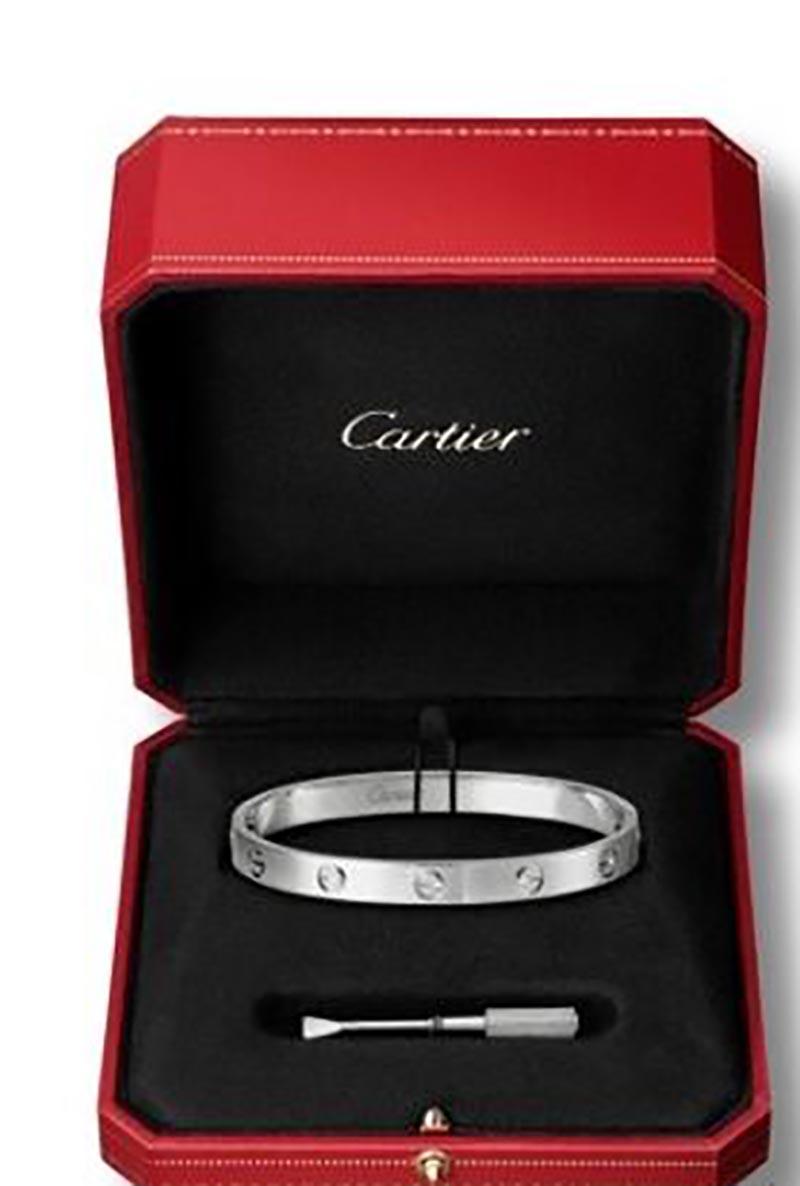 Designer: Cartier

Collection: Love

Style: Bracelet/ Bangle 

Metal: White  Gold 

Metal Purity: 18k

Total Item  Weight ( Grams) : 30.5

Bracelet Size : 16 = 16 Cm

Mechanism: Old Screw System (screws come off) 

Hallmarks: Cartier; Serial #;