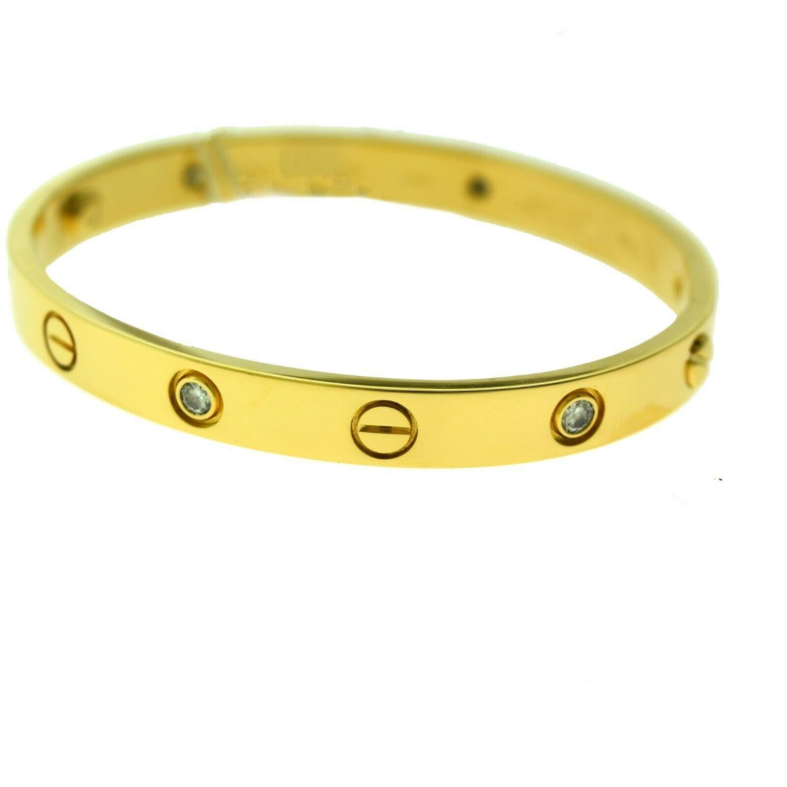 Designer: Cartier

Collection: Love

Style: Bangle Bracelet

Metal: Yellow Gold

Metal Purity: 18k

Bracelet Size: 16 = 16 cm

Stones: 6 Round Brilliant Cut Diamonds

Hallmarks: 16, Au750 Cartier, Serial No., 1998

Screw System: 