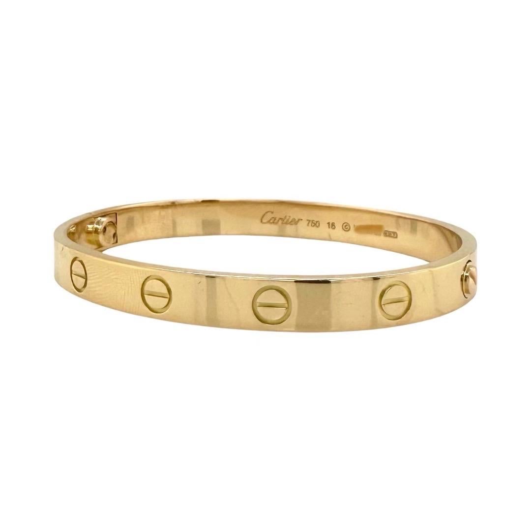 This Cartier Love Bracelet is the perfect way to add a touch of luxury to any look . Crafted from 18k yellow gold this bracelet is a timeless and iconic piece that will retain its value overtime. It has the new screw system and comes with box and