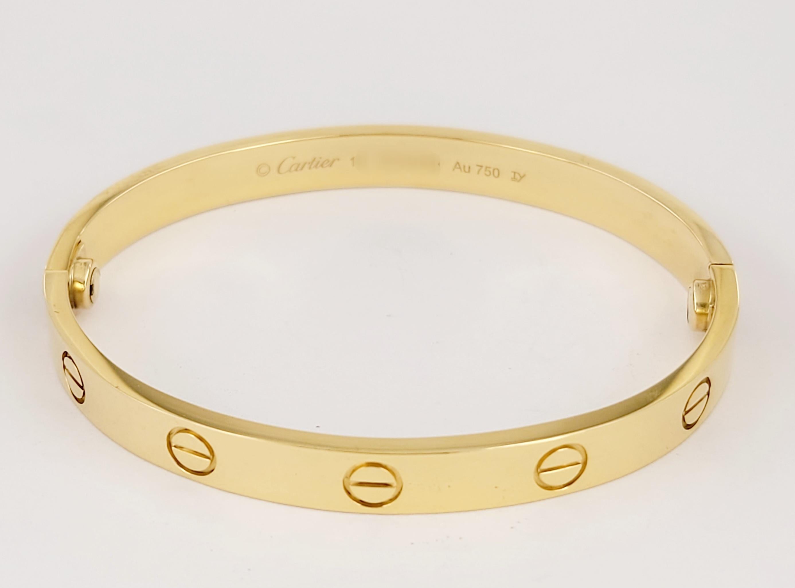 Cartier Love bracelet in 18K Yellow Gold Size 16 In Excellent Condition For Sale In New York, NY