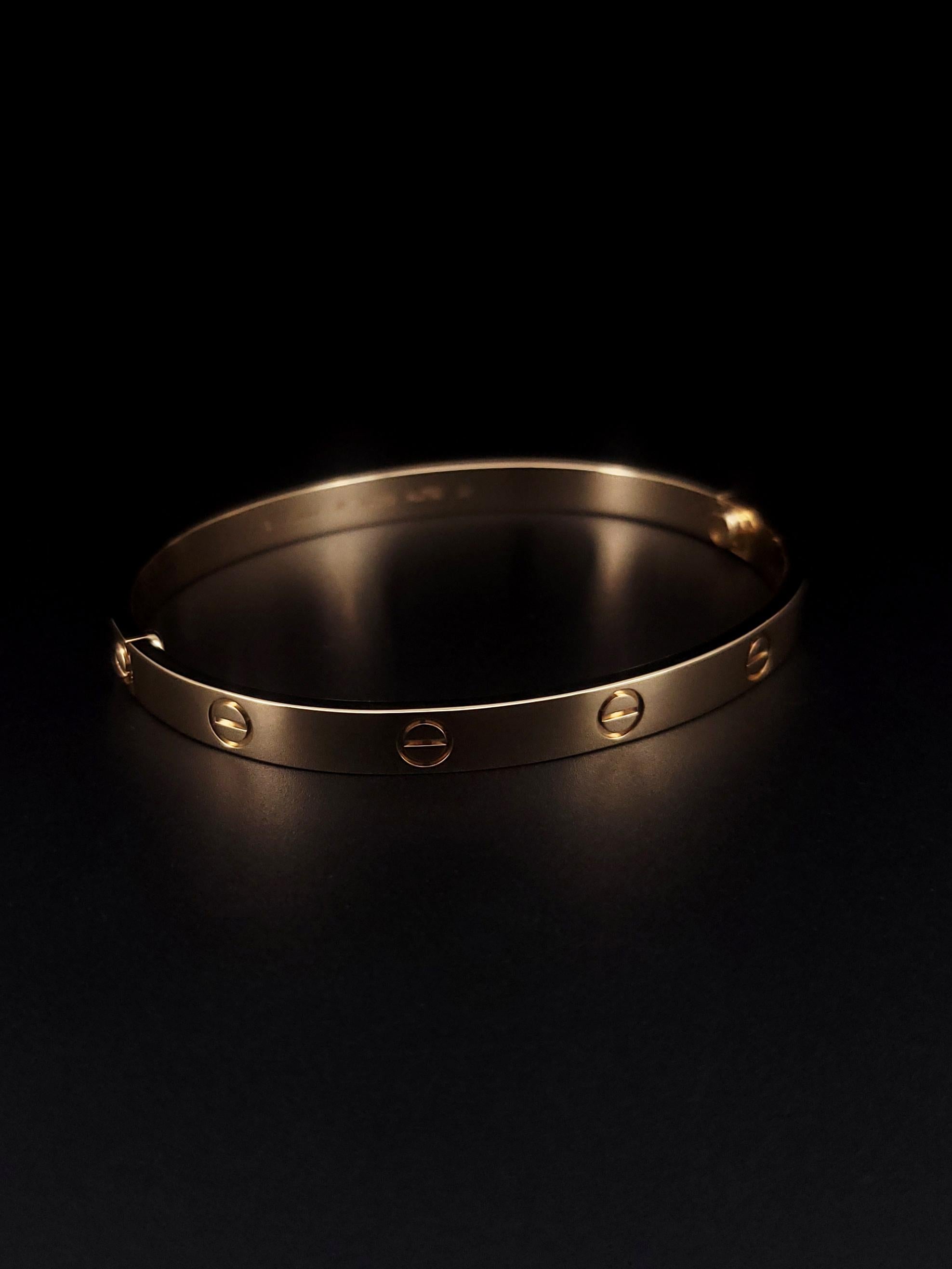 Women's Cartier Love Bracelet in 18K Yellow Gold Size 19 For Sale