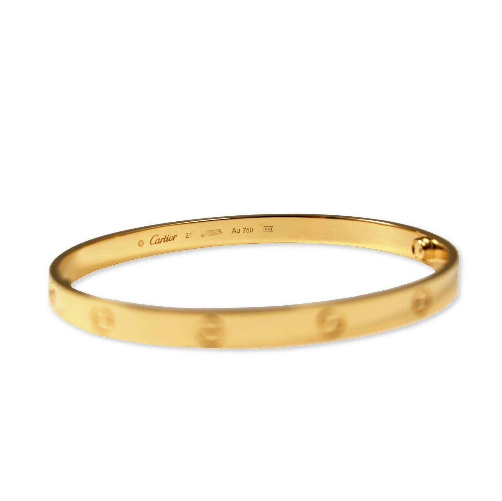Designer: Cartier

Collection: Love

Style:  New Screw System

Metal: Yellow  Gold 

Metal Purity: 18k 

Screw System: New Screw System

Total ItemWeight (Grams): approx. 38.8g

Bracelet Size : 21 = 21 cm ​​​​​​​

Hallmarks: Cartier; Serial #;