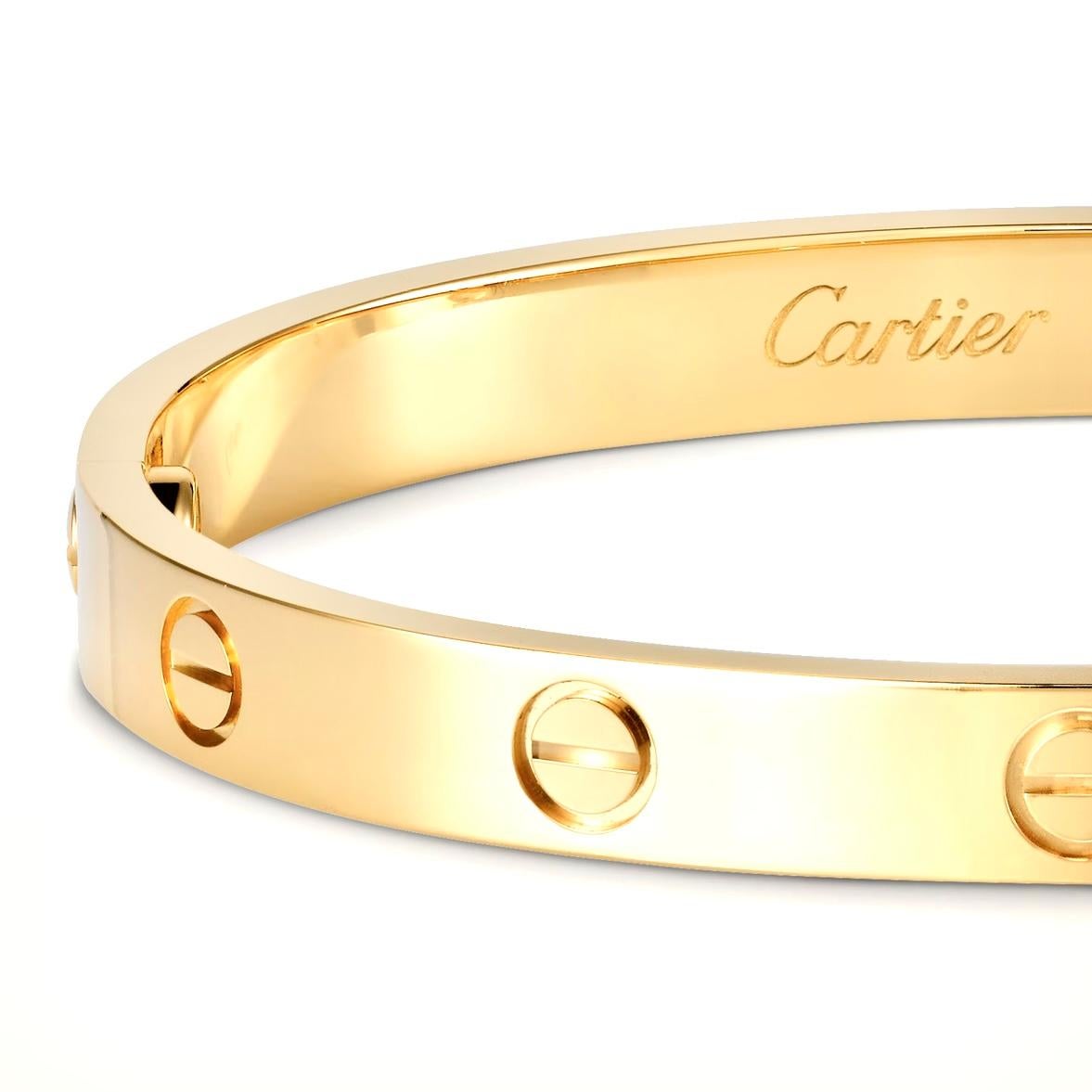 Designer: Cartier
Collection: Love
Style: Bangle
Metal: Yellow Gold 
Metal Purity: 18K 
Screw Style System: New Screw System 
Bracelet Size: 21 = 21 cm
Hallmarks: Cartier; Serial #, 750
Includes: 24 Months Brilliance Jewels Warranty
Cartier Box &