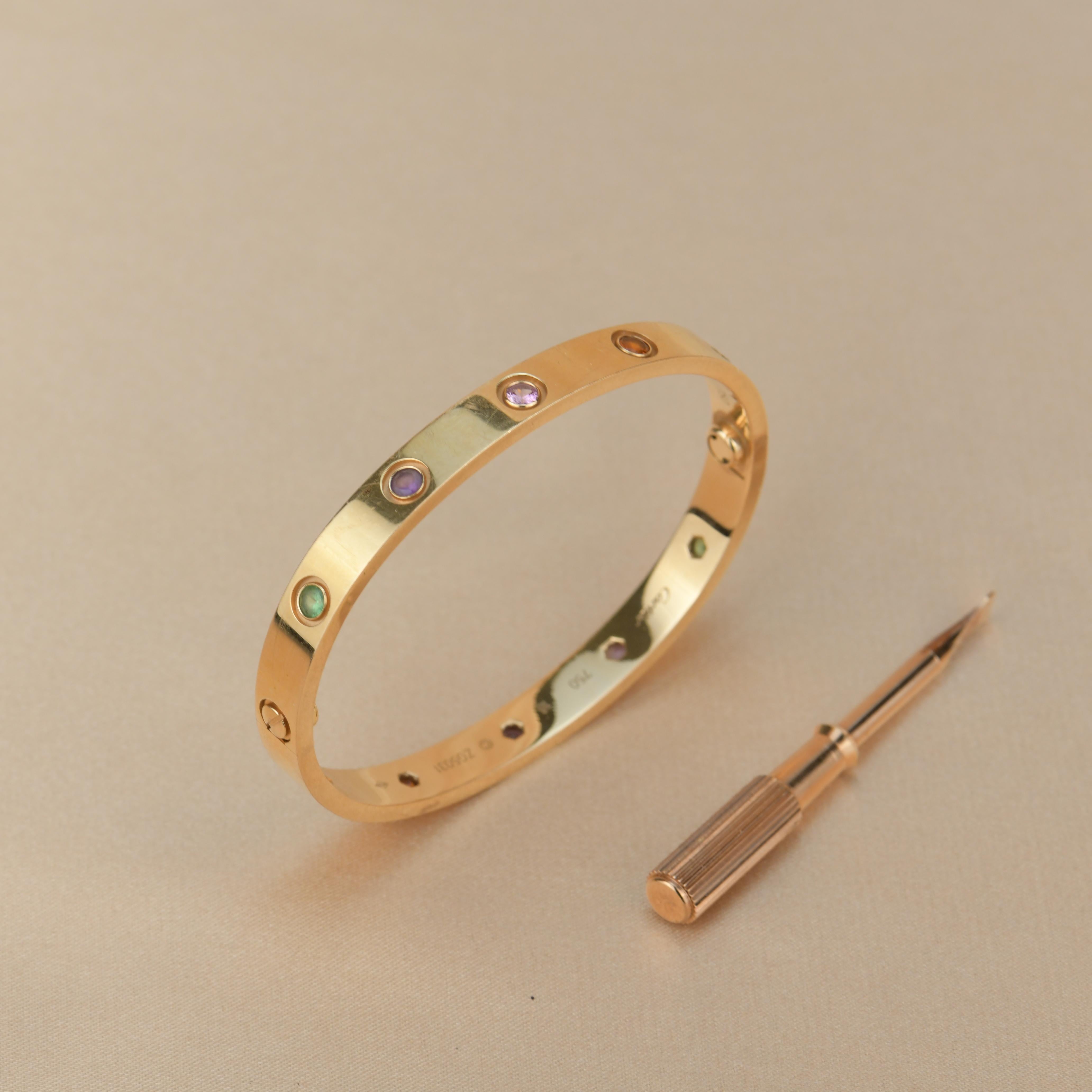 LOVE bracelet, 18K rose gold, set with 2 pink sapphires, 2 yellow sapphires, 2 green garnets, 2 orange garnets, and 2 amethysts. 
Comes with Cartier Box. Size 16
__________________________________

Dandelion Antiques Code AT-0799
Brand Cartier
Model