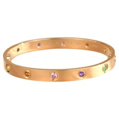 Cartier Love-Armband aus Roségold mit mehreren Edelsteinen