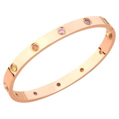 Cartier Bracelet d'amour multi-gemmes arc-en-ciel en or rose