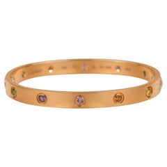 Cartier Love-Armband aus Roségold mit mehreren Edelsteinen
