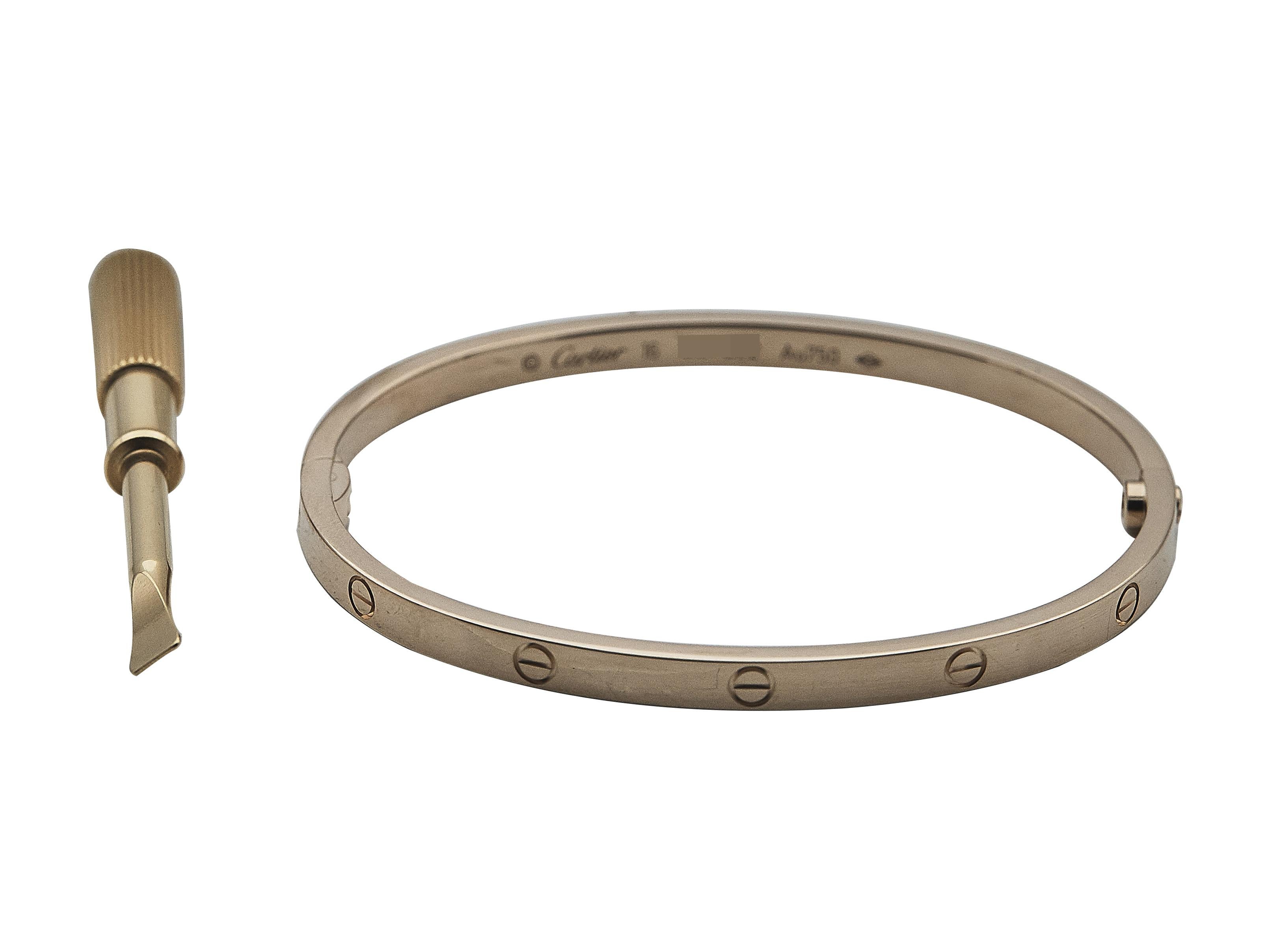 The bracelet: A Cartier Love bracelet with a single-screw closure. This Small model is designed in eighteen karat rose gold. It is a size 16.

The bracelet is in excellent condition, with only a few minor scratches that are expected with normal