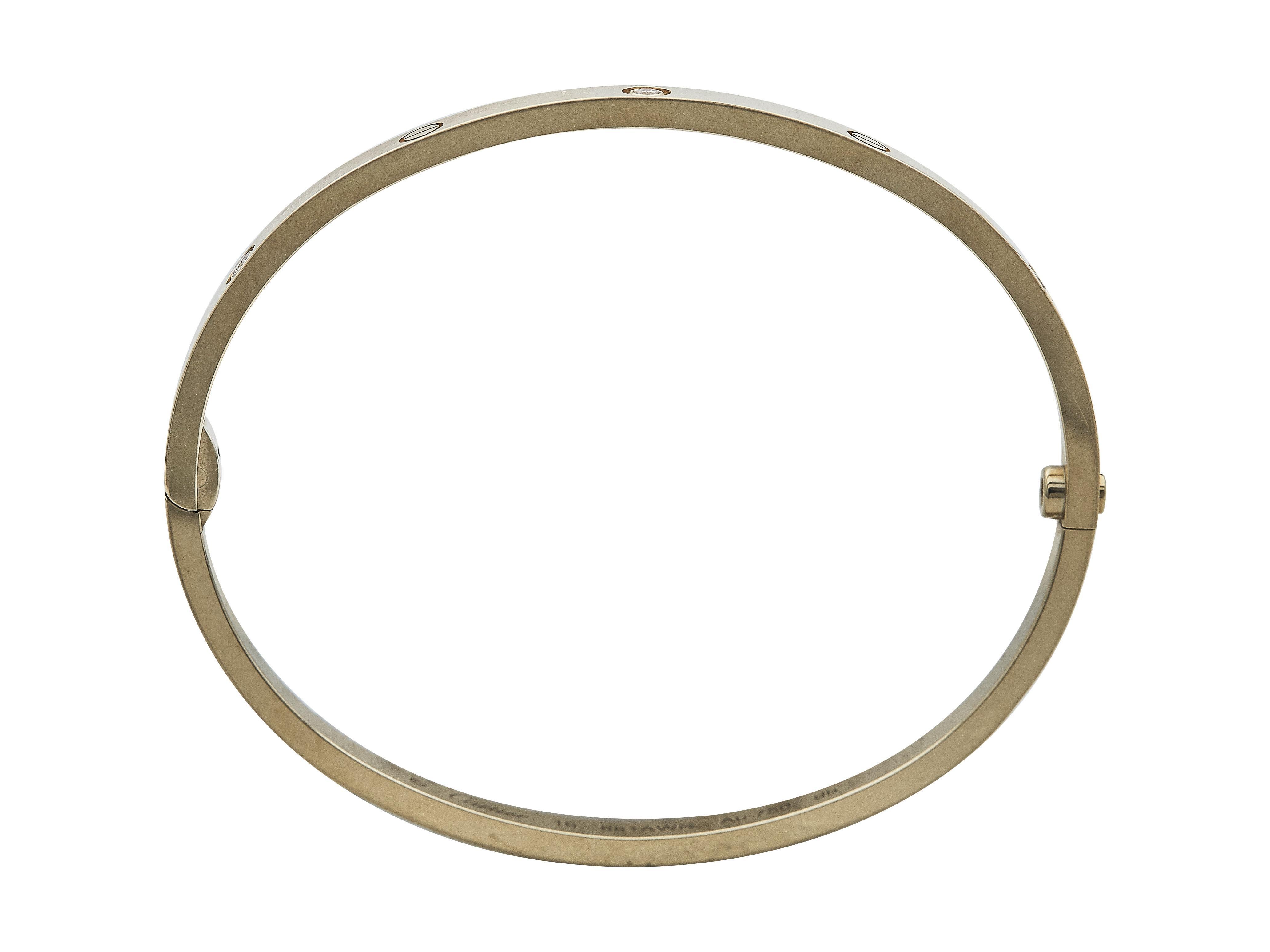 The bracelet: A Cartier LOVE bangle bracelet. This small model is fitted with a single-screw closure and set with six round brilliant cut diamonds. It is a size 16.

More on the collection: The Cartier Love Bracelet is a timeless piece that blends