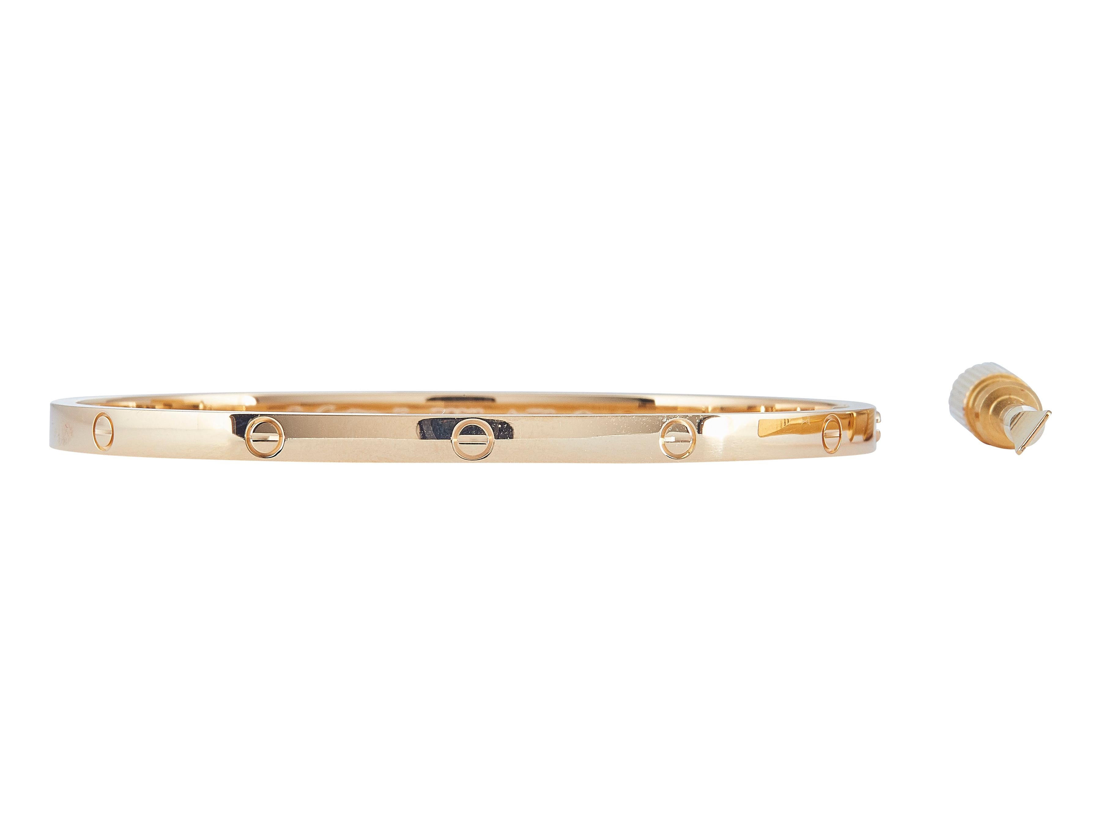 The bracelet: A Cartier Love bracelet in eighteen karat yellow gold. This Small Model is designed with a single hinged and single screw closure.

Accompanied by …

Original box
Certificate of authenticity
Service papers

The bracelet is in excellent