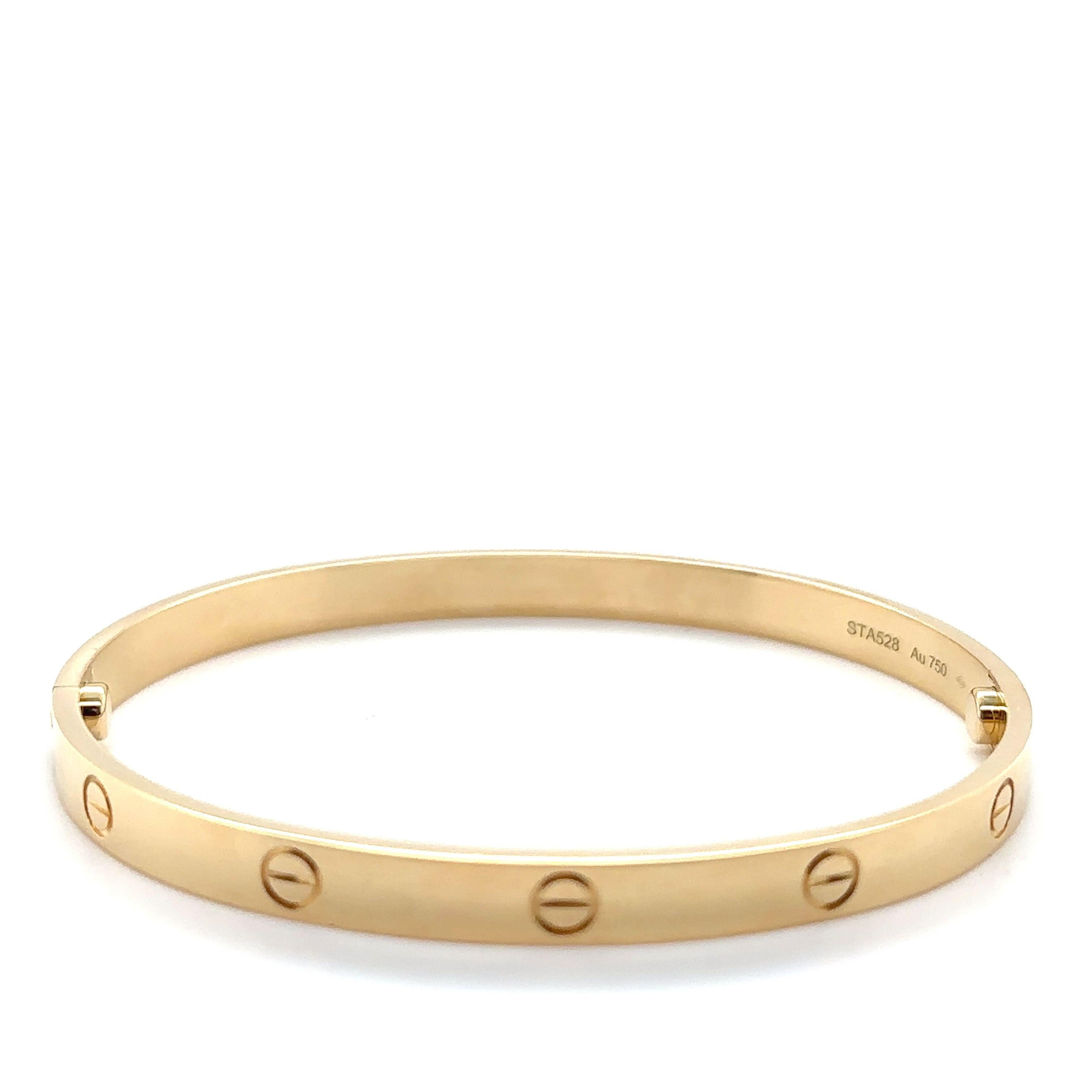 A Cartier 18ct Yellow Gold Love Bangle.

Width 6mm. Serial number: STA528, Size 21cm. Weight 38.44 grams.
Metal: 18ct Yellow Gold
Carat: N/A
Colour: N/A
Clarity:  N/A
Cut: N/A
Weight: 38.44 grams
Engravings/Markings: Cartier 21 STA528