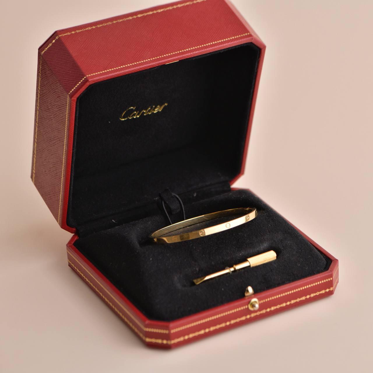 SKU         AT-1789
Brand	Cartier
Model	B6047518
Serial No	HK****
Date	Circa 2018
______________________________________________________________
Metal	18K Yellow Gold
Width	Approx. 3.65 mm
Bracelet Size	18
Retail Price 	4,550 incl. VAT / $4,750.00 /