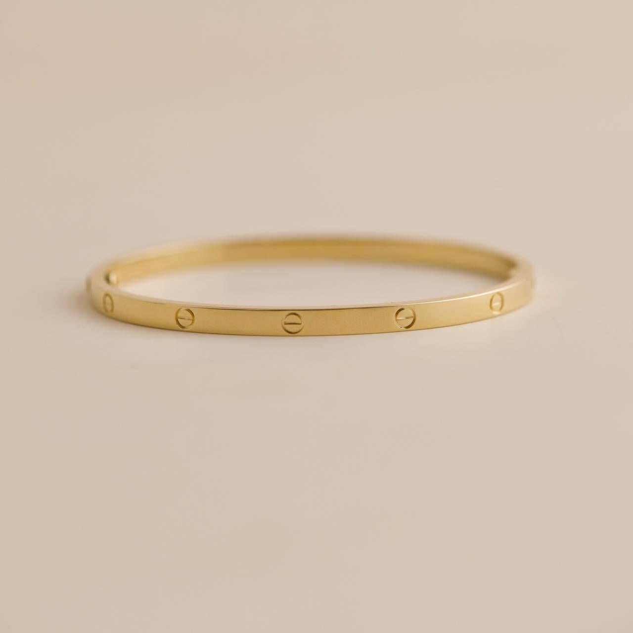 Women's or Men's Cartier Love Bracelet Small Model 18K Yellow Gold Size 18 For Sale