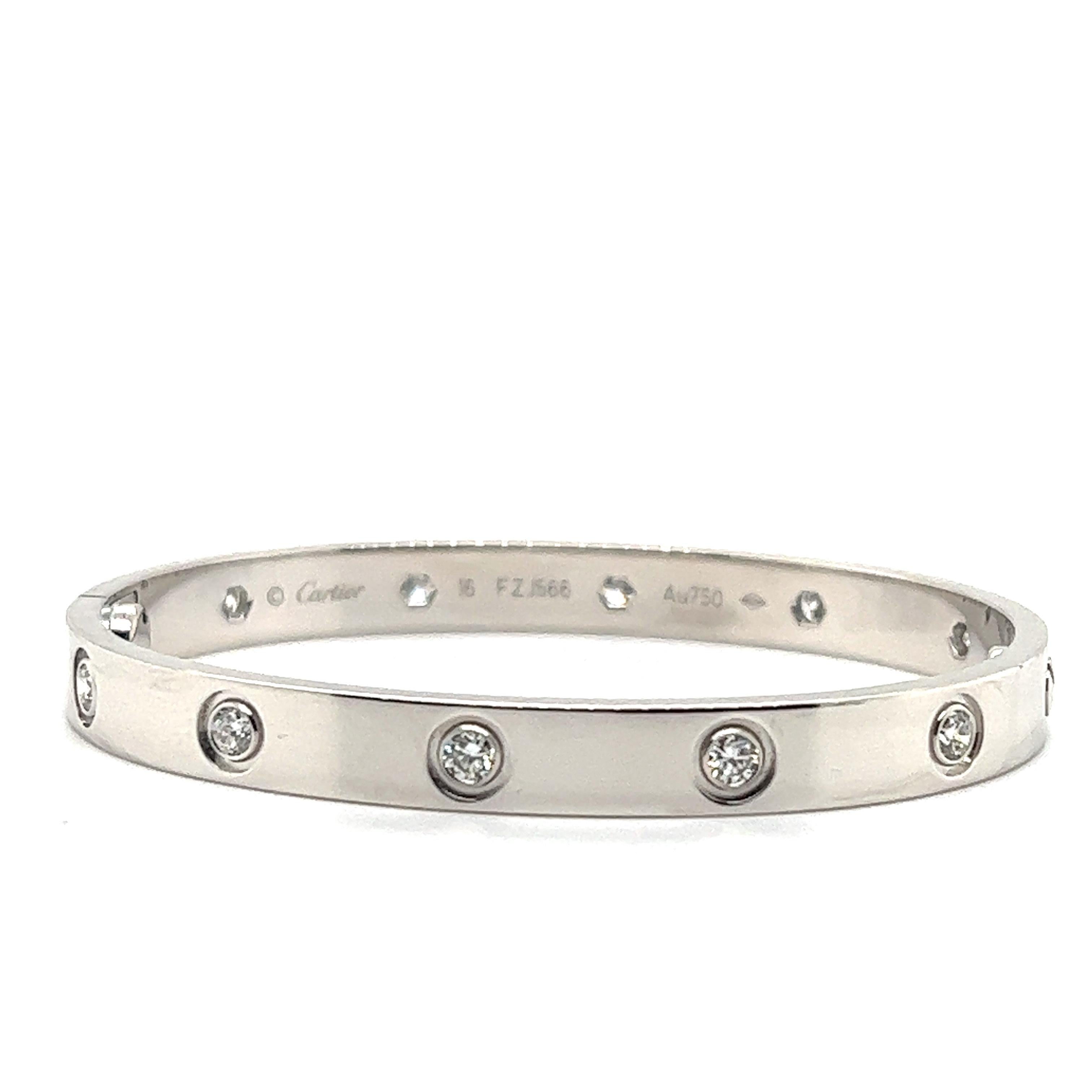 Beautiful iconic design from famed designer Cartier. This beautiful bracelet is crafted in 18k white gold.  The bracelet is from the Love collection. This iconic bracelet is set with 10 individual diamonds and is a size 16. The bracelet is fully