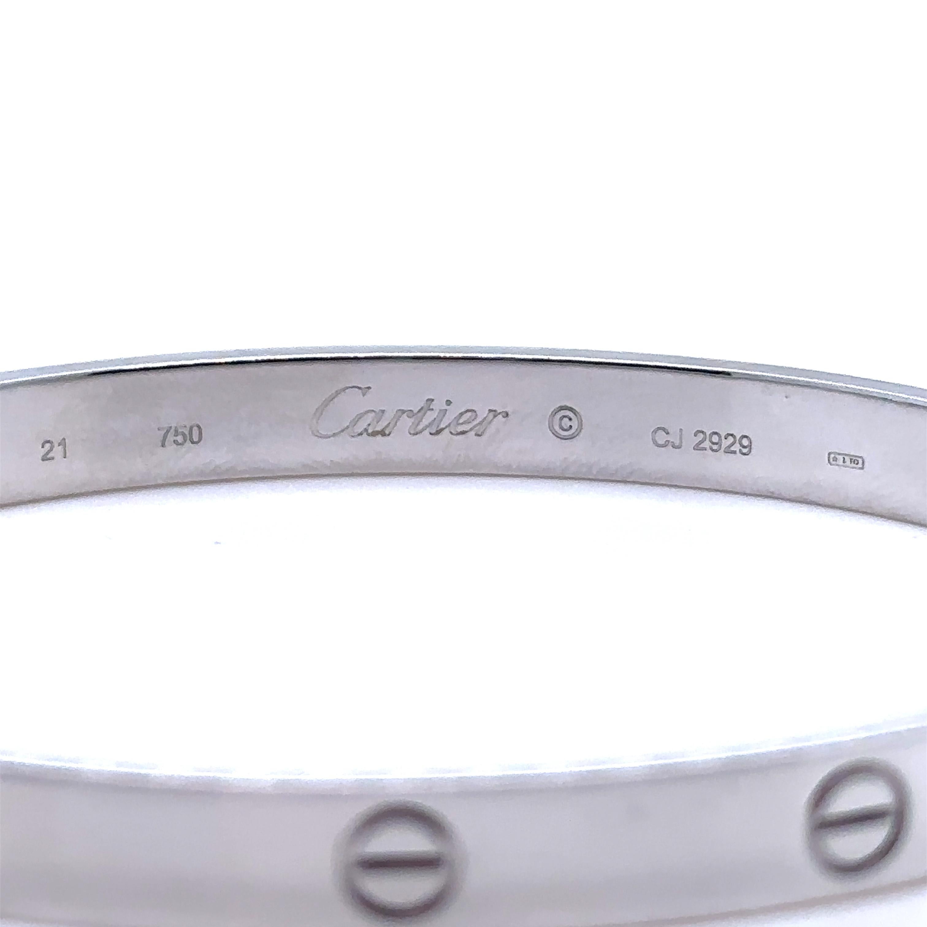Unique features: 

A Cartier love bracelet. Made of 18 ct White Gold.

Metal: 18ct White Gold
Carat: N/A
Colour: N/A
Clarity:  N/A
Cut: N/A
Weight: 41.1 grams
Engravings/Markings: Signed 21 750 Cartier CJ2929

Size/Measurement: Size 21

Current