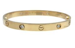 Cartier Four Diamond Love Bangle Bracelet 18 Karat Yellow Gold with Box, Size 17