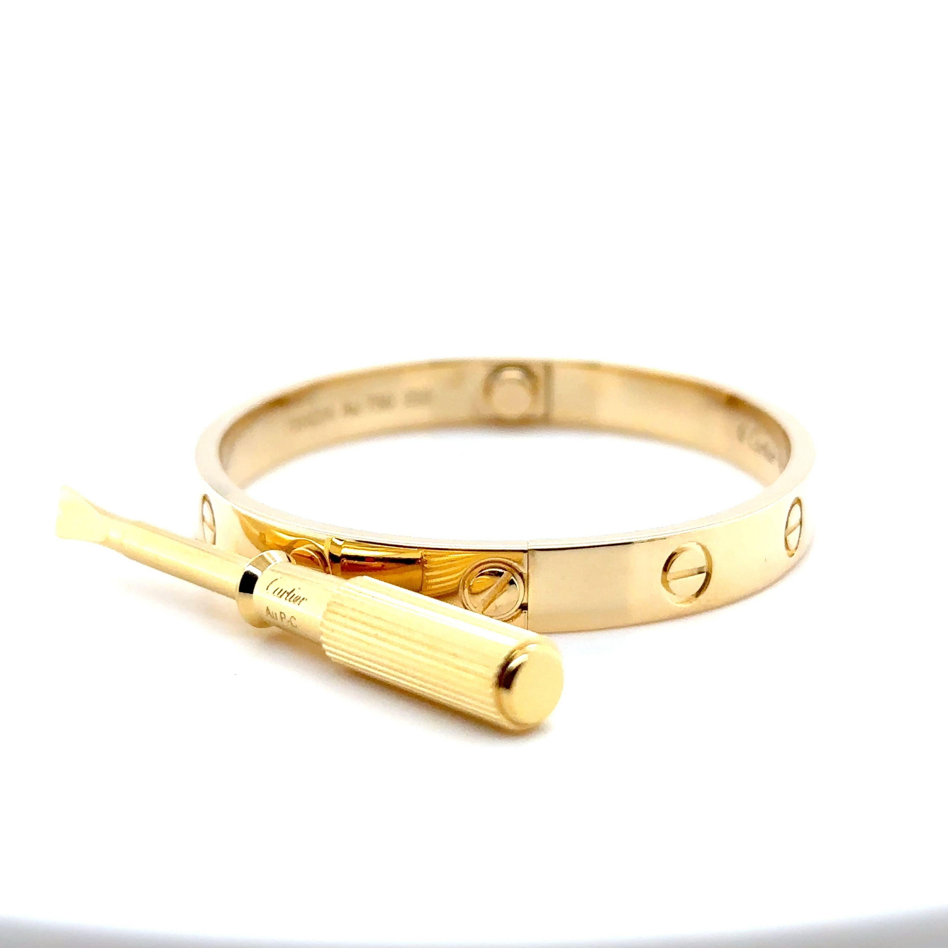 A Cartier 18ct Yellow Gold Love Bracelet.

Size 16cm, Width 6.1mm  Serial Number - TSR024.

Metal: 18ct Yellow Gold
Carat: N/A
Colour: N/A
Clarity:  N/A
Cut: N/A
Weight: 30.37 grams
Engravings/Markings: Cartier 16 TSR024 Au 750