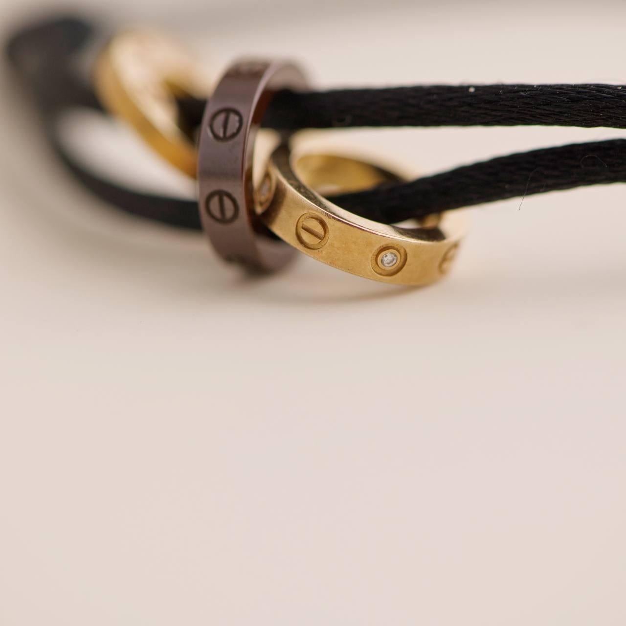 Cartier Love Charity Diamant Brown Keramik Gold 3 Reifen Schwarz Seide Cord Armband für Damen oder Herren