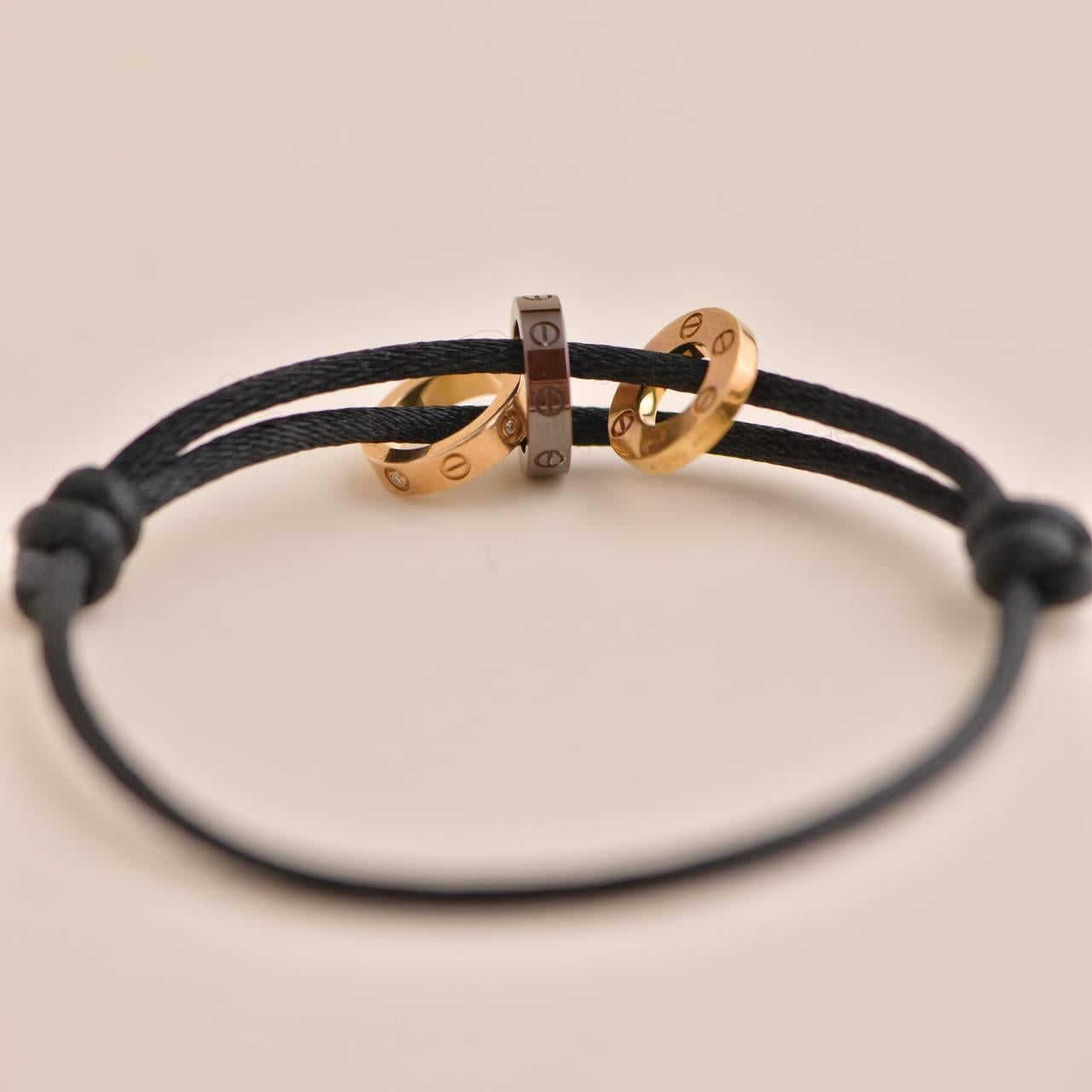 Cartier Love Charity Diamant Brown Keramik Gold 3 Reifen Schwarz Seide Cord Armband 1