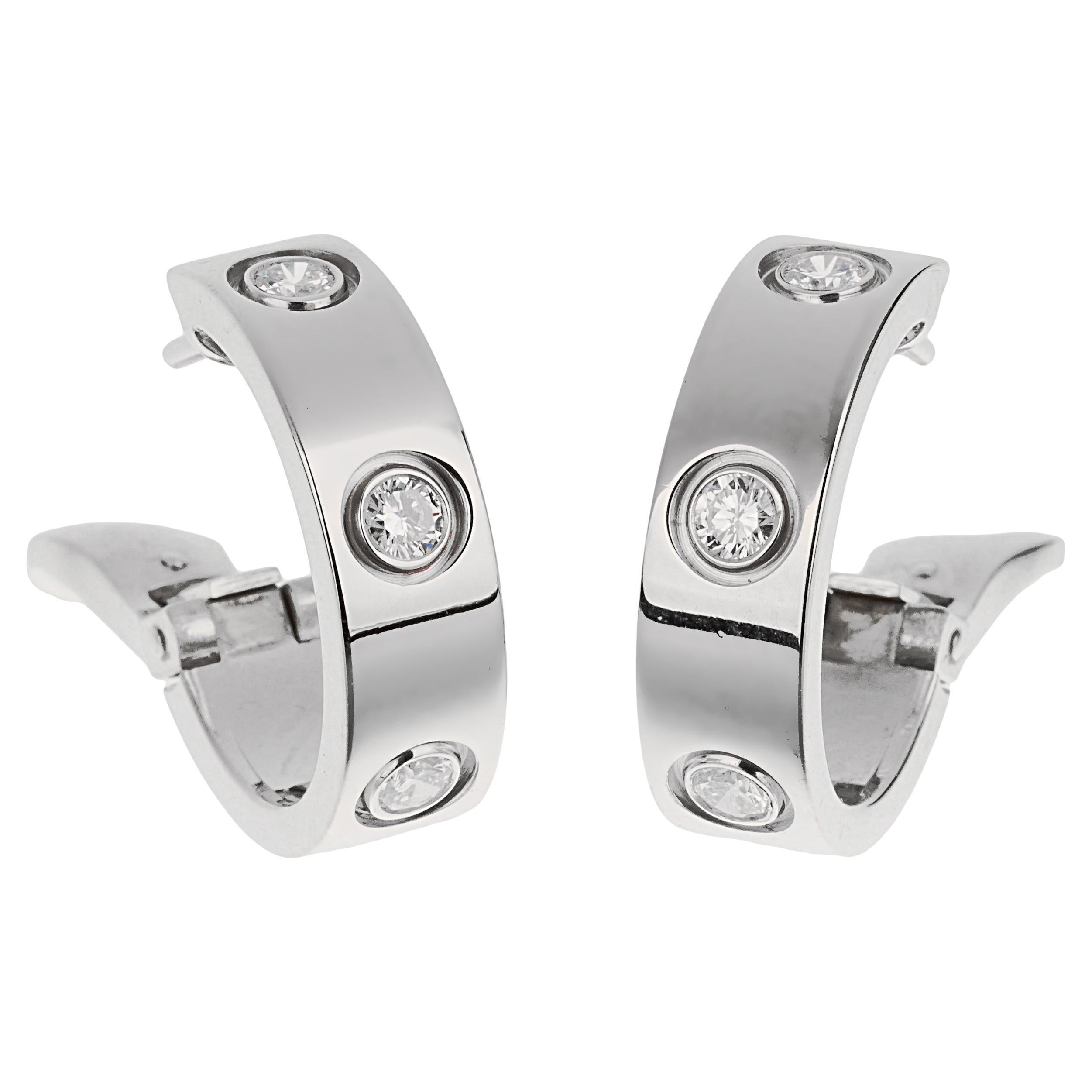How do you open Cartier Love earrings?