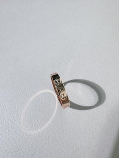 Anello a fascia stretta della collezione Cartier Love in oro rosa 18 carati