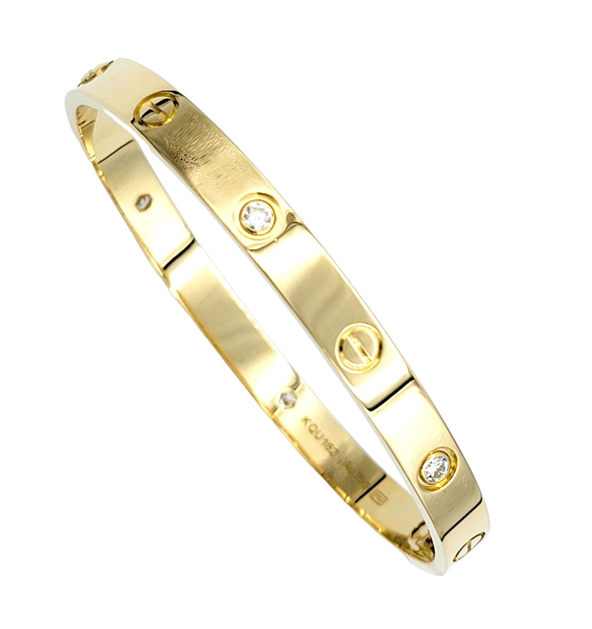 Iconic Love Collection bangle bracelet with diamonds from luxury jeweler, Cartier. Includes box, outer box, and screwdriver. This simple, yet effortlessly timeless piece makes a chic statement on the wrist. With its clean lines, perfect symmetry,