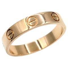 Cartier Love Collection Narrow Polished 18 Karat Rose Gold Band Ring 