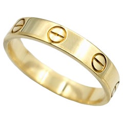 Cartier Love Collection Polished 18 Karat Yellow Gold Narrow Band Ring Size 55