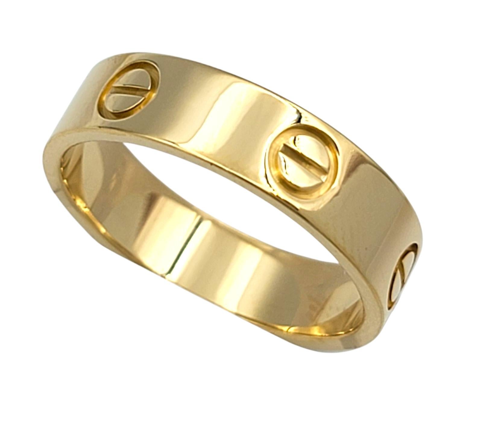 Ring Size: 59 / US 8.75

This iconic Cartier LOVE ring is crafted in rich 18 karat yellow gold and features the signature screw motifs that have made the design an enduring symbol of commitment. With its polished finish and timeless silhouette, the