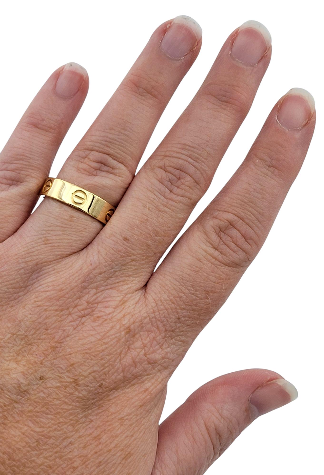 Cartier Love Collection Unisex Band Ring Polished 18 Karat Yellow Gold, Size 59 3