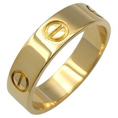 Cartier Love Collection Unisex Band Ring Polished 18 Karat Yellow Gold, Size 59