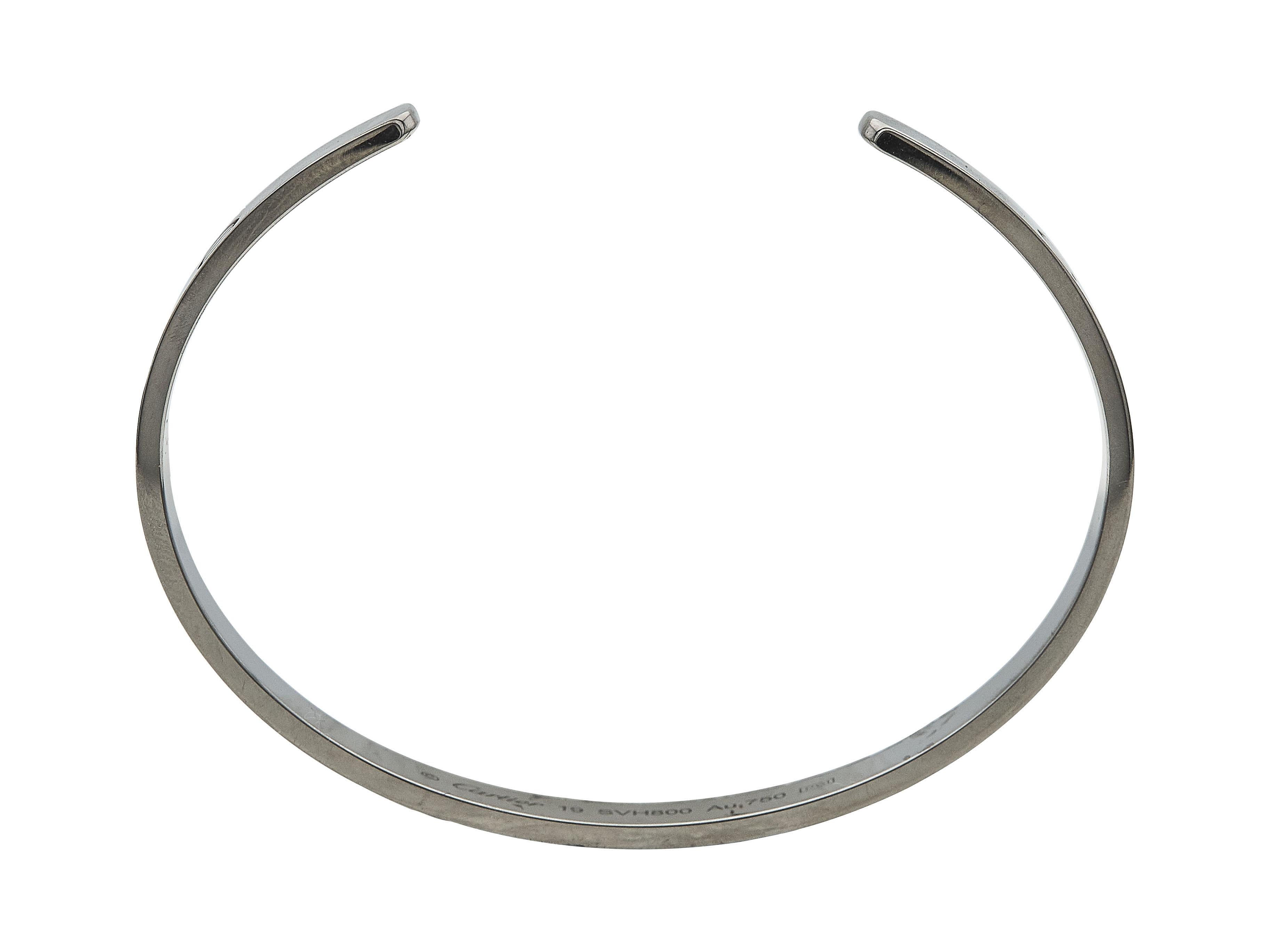 Das Armband: Ein offenes Manschettenarmband von Cartier Love. Das Armband aus achtzehn Karat Weißgold hat die Größe 19.

Die Manschette wird von ihrem...
Originalverpackung
Echtheitszertifikat
Servicepapier

Das Armband ist in ausgezeichnetem