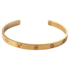 Cartier Love Manschette aus 18 Karat Gelbgold