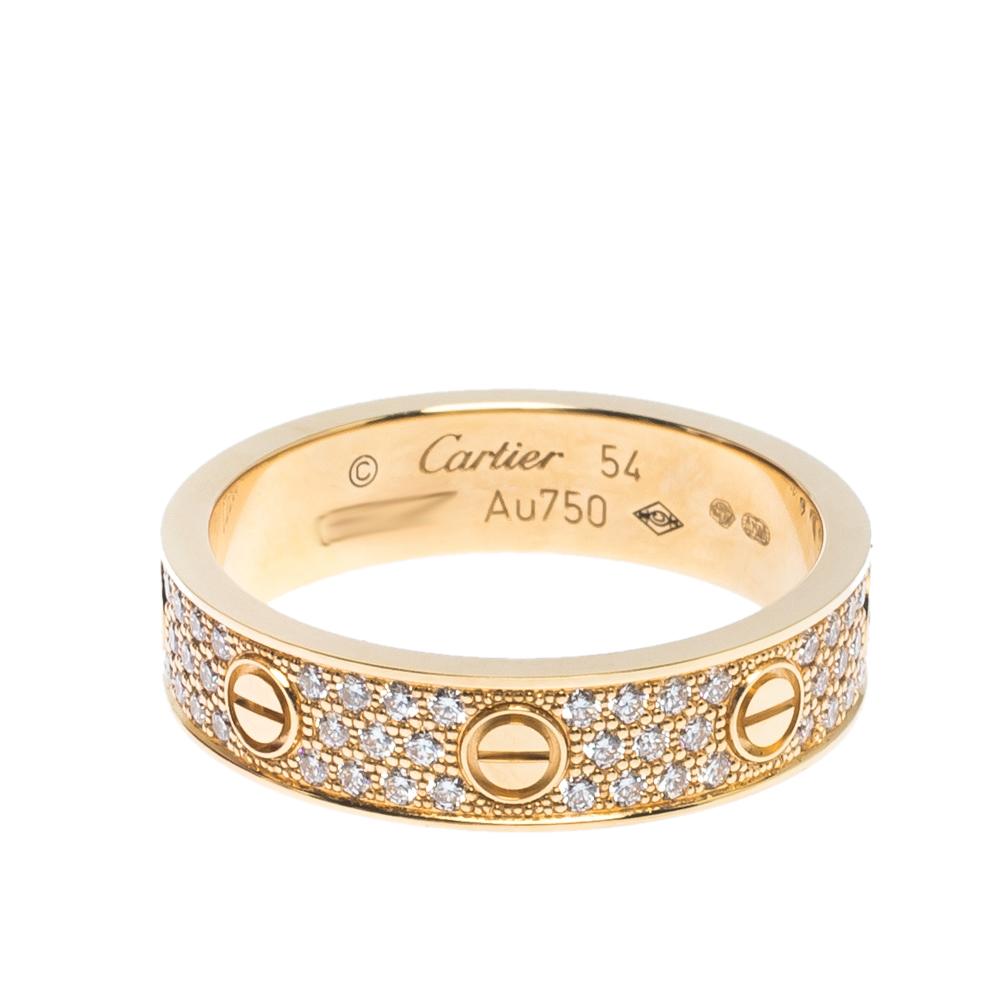 One of the most iconic and loved designs from the house of Cartier, the stunning Love ring is an icon of style and luxury. This is an updated version that arrives in 18k rose gold decorated beautifully with pave set diamonds all over. The ring also