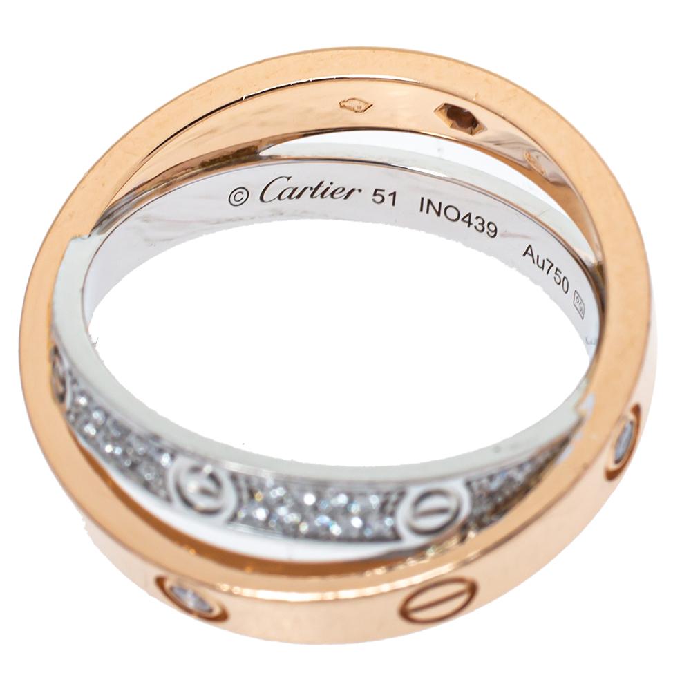 The 'Love' collection from Cartier is a timeless tribute to the feeling of love. Celebrating that everlasting bond of love, this ring comes crafted from rose gold and white gold and exhibits two conjoined bands that are detailed with the iconic