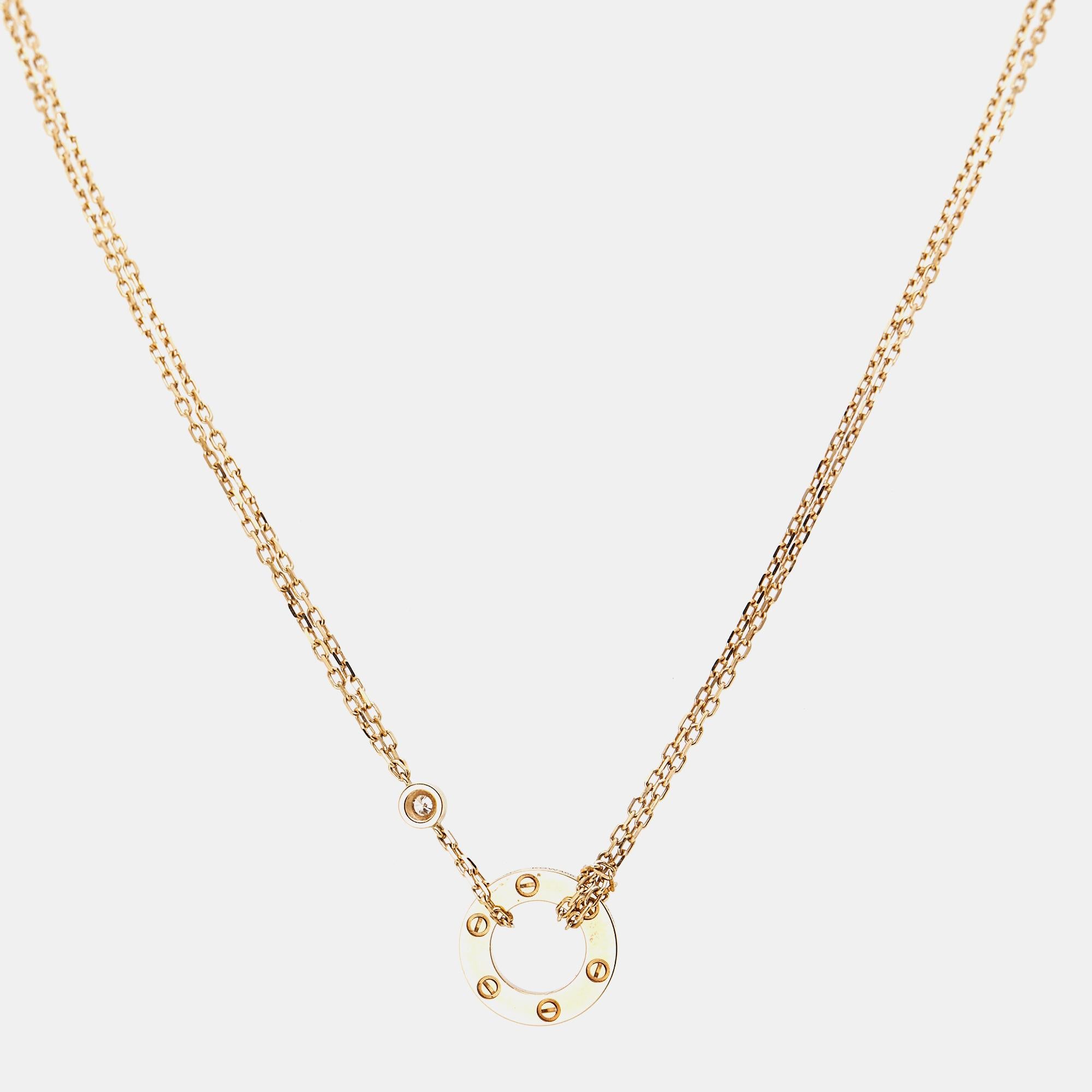 This Love necklace is a testament to the wondrous craftsmanship and the painstaking effort that goes into making a Cartier wonder! Crafted from 18K yellow gold, the necklace flaunts the iconic screw motifs, brilliant-cut diamonds, and double chains