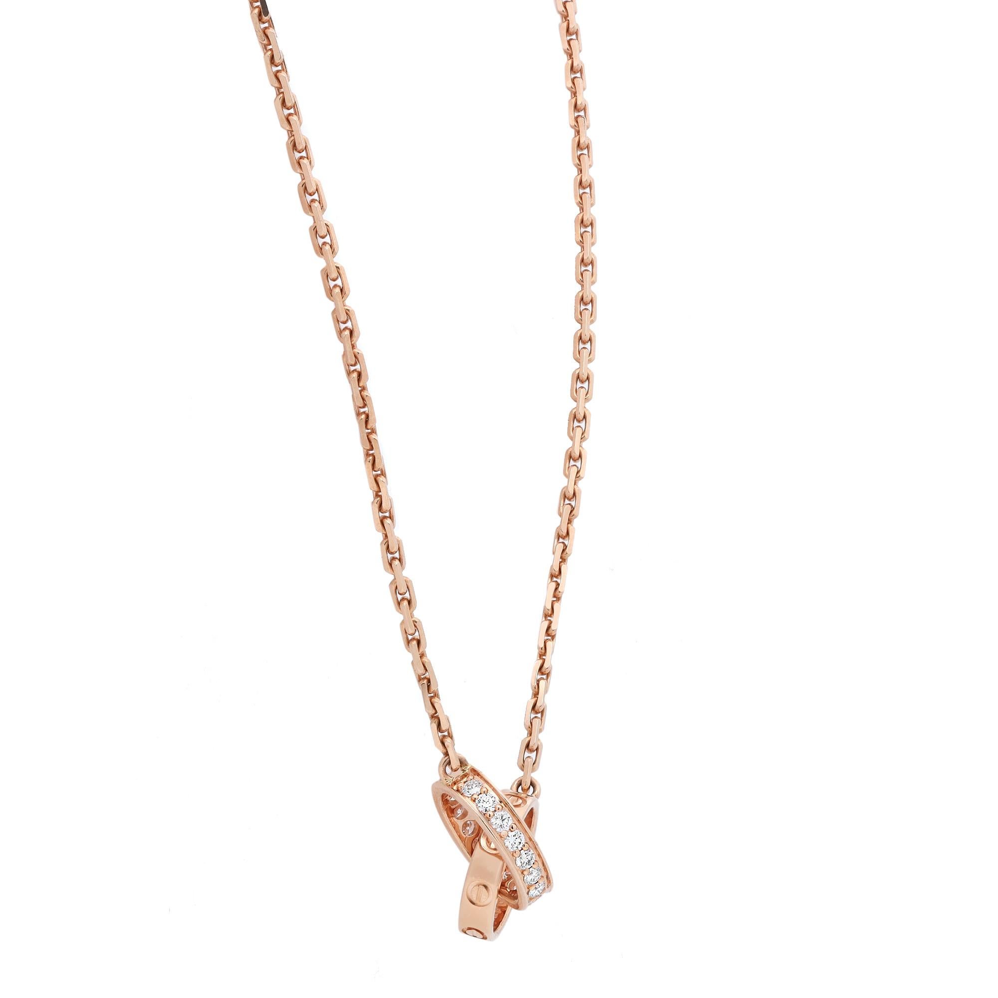 Cartier Love diamond necklace, crafted in 18K rose gold. This stunning necklace is accentuated by 18 round brilliant cut diamonds weighing 0.22 carat. Width: 2.65 mm. Inner diameter: 7.6 mm. Chain length: 16.5 inches. Total weight: 7.30 grams.
