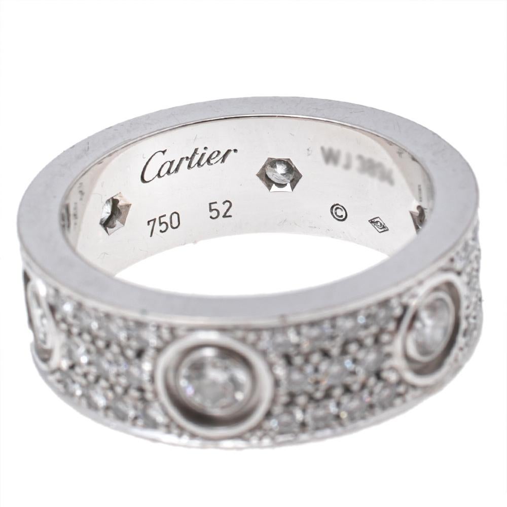 Cartier's Love band continues to be a favored choice when it comes to choosing a wedding or engagement ring. Highlighted by screw motifs, the Love icon from the 1970s heralds the idea of timeless romance. This here in size 52 is sculpted using 18k