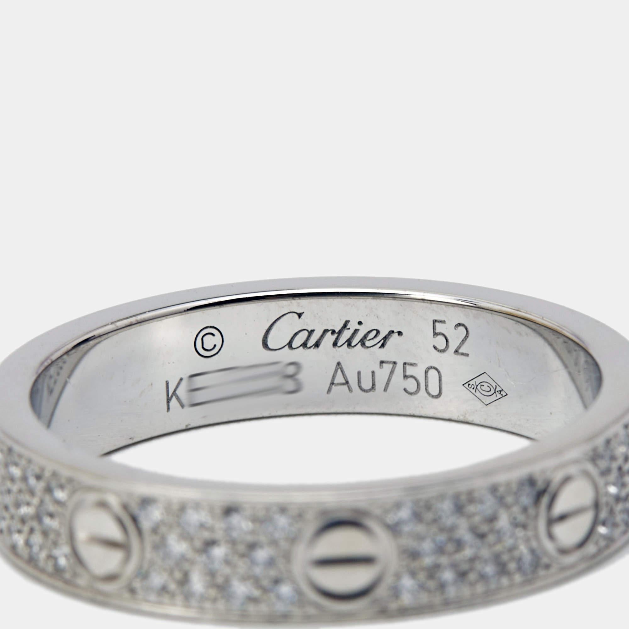 Precious stones are used to transform this Cartier Love ring into an exceptional jewel you can wear on special days. Sculpted using 18k white gold and covered in incredible diamonds, the ring is a treat to the eyes. It is also added with the iconic