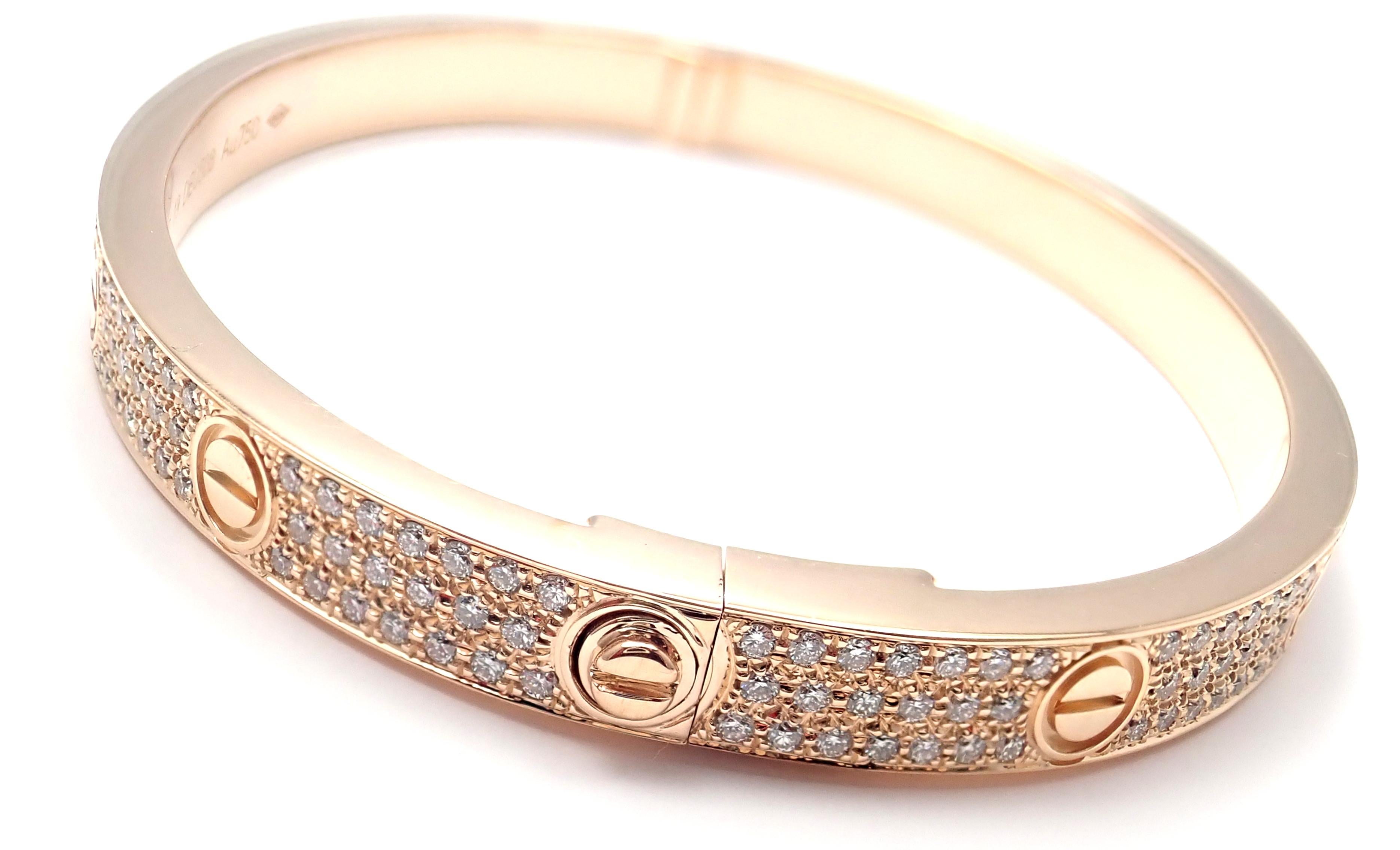 18k Rose Gold Diamond Paved LOVE Bangle Bracelet by Cartier. 
SIZE 19. 
With 204 brilliant cut VS1 clarity, E color diamonds totaling 2 carats.
This bracelet comes with Cartier box & Cartier certificate of authenticity and a sales receipt.
Retail
