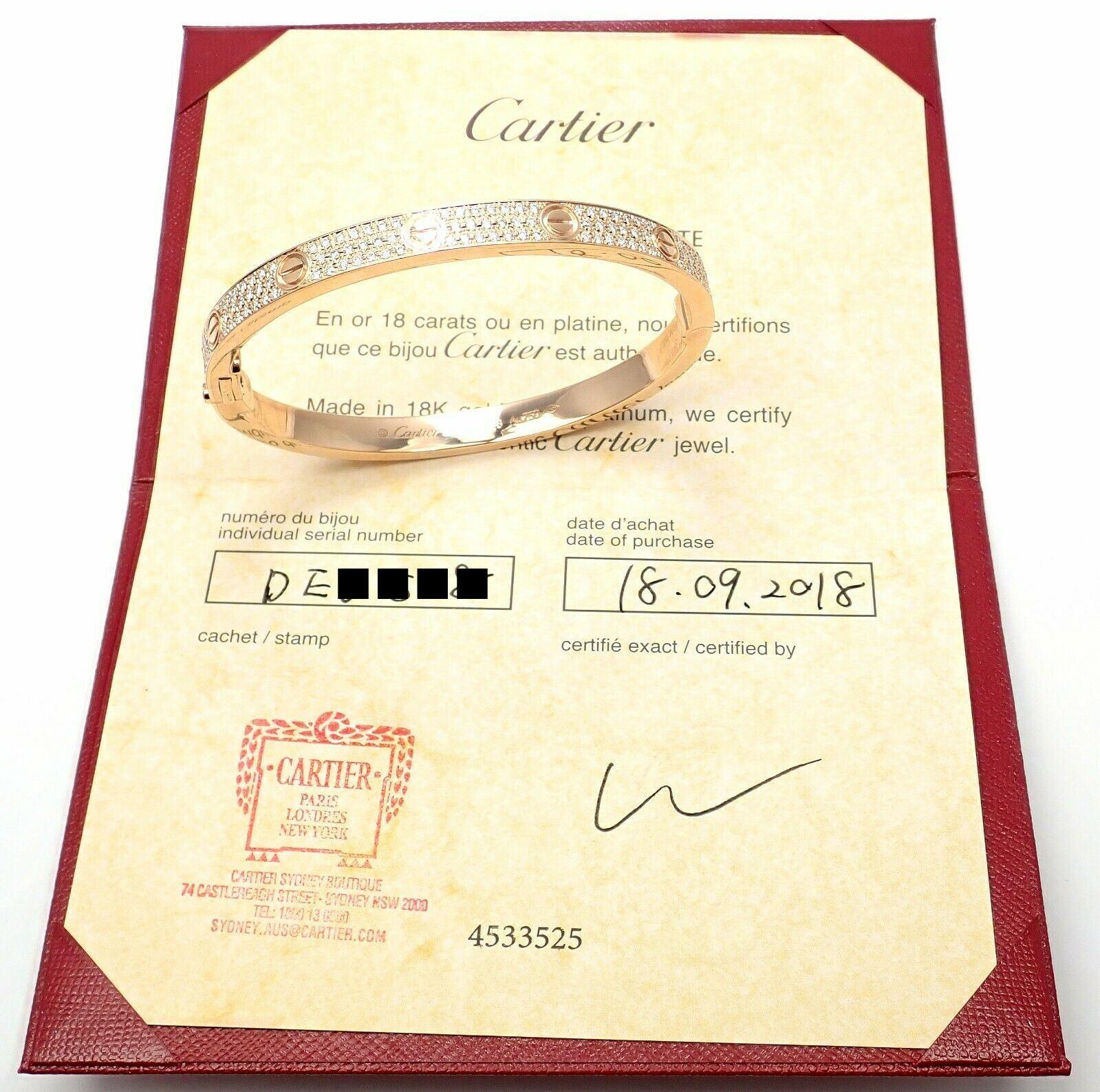 18k Rose Gold Diamond Paved LOVE Bangle Bracelet by Cartier. 
SIZE 19. 
With 204 brilliant cut VVS1 clarity, E color diamonds totaling 2 carats.
This bracelet comes with Cartier box & Cartier certificate of authenticity and a sales receipt.
Retail