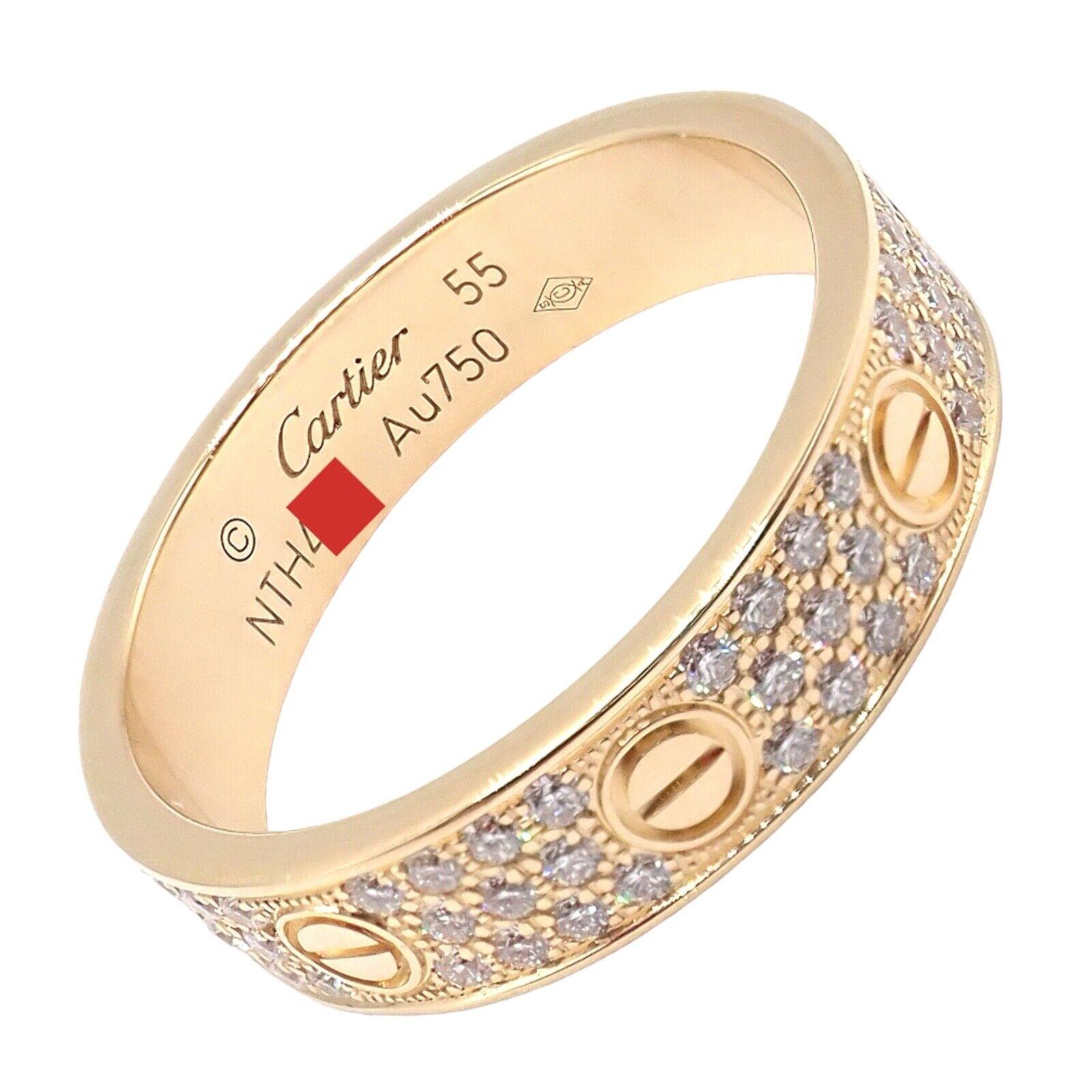 18k Yellow Gold Diamond Paved Love Band Ring by Cartier.
Experience the epitome of luxury with this Authentic Cartier Love 18k Yellow Gold Diamond Paved Ring. Sized at 7.25 (55), this stunning piece features radiant pave diamonds embedded in warm